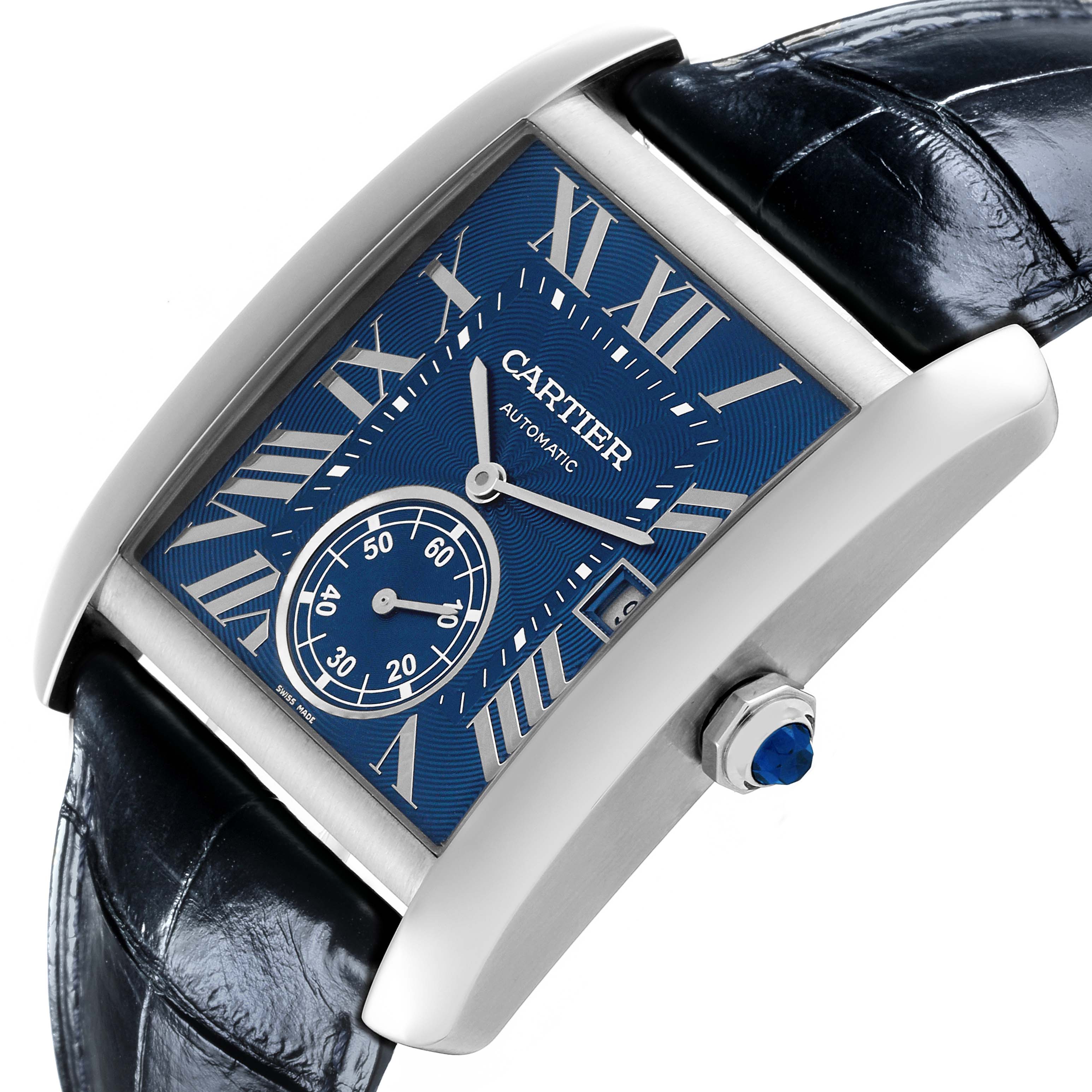 The Cartier Tank MC WSTA0010 Men's Stainless Steel Blue Dial WSTA0010 Men's Stainless Steel Blue Dial watch is shown at an angled close-up, highlighting the blue dial, Roman numerals, and crown with a blue stone.