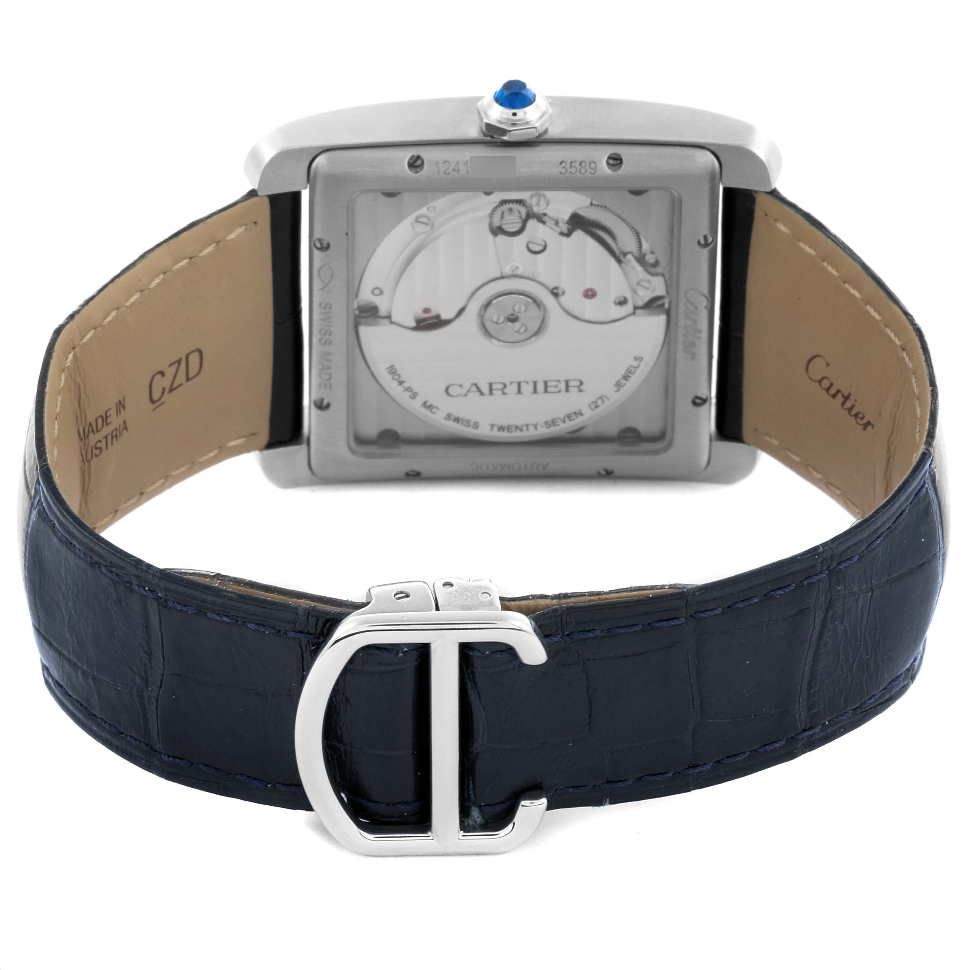 The image shows the back view of the Cartier Tank MC WSTA0010 Men's Stainless Steel Blue Dial WSTA0010 Men's Stainless Steel Blue Dial watch, displaying its movement and leather strap with a clasp.