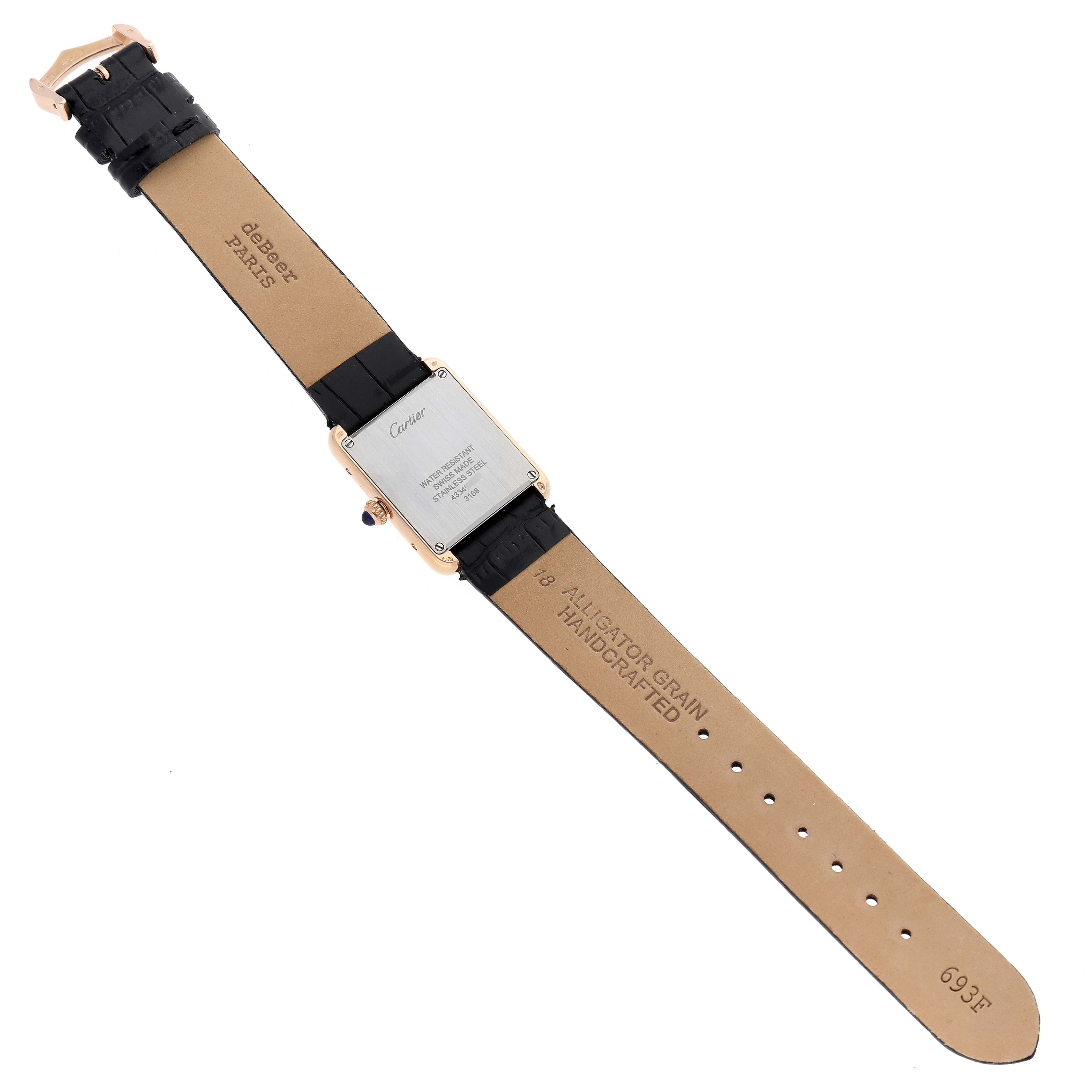 The watch shown is a Cartier Tank Solo W5200024 Women
s Steel and Gold (two tone) Silver Dial W5200024 Women
s Steel and Gold (two tone) Silver Dial, viewed from the back, displaying its case back, leather strap, and buckle.