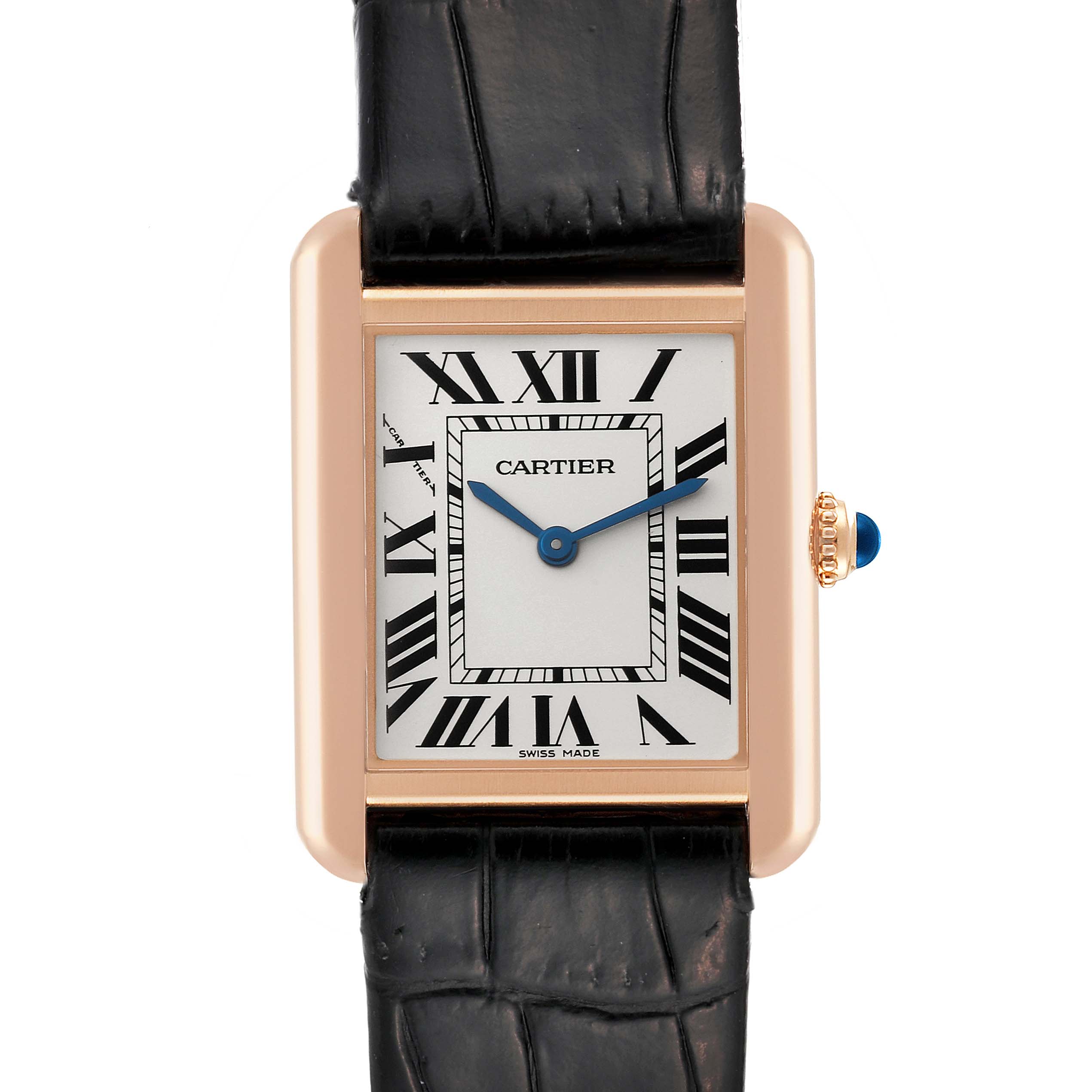 The image shows a front view of the Cartier Tank Solo W5200024 Women
s Steel and Gold (two tone) Silver Dial W5200024 Women
s Steel and Gold (two tone) Silver Dial watch, highlighting its rectangular face, Roman numerals, and black leather strap.