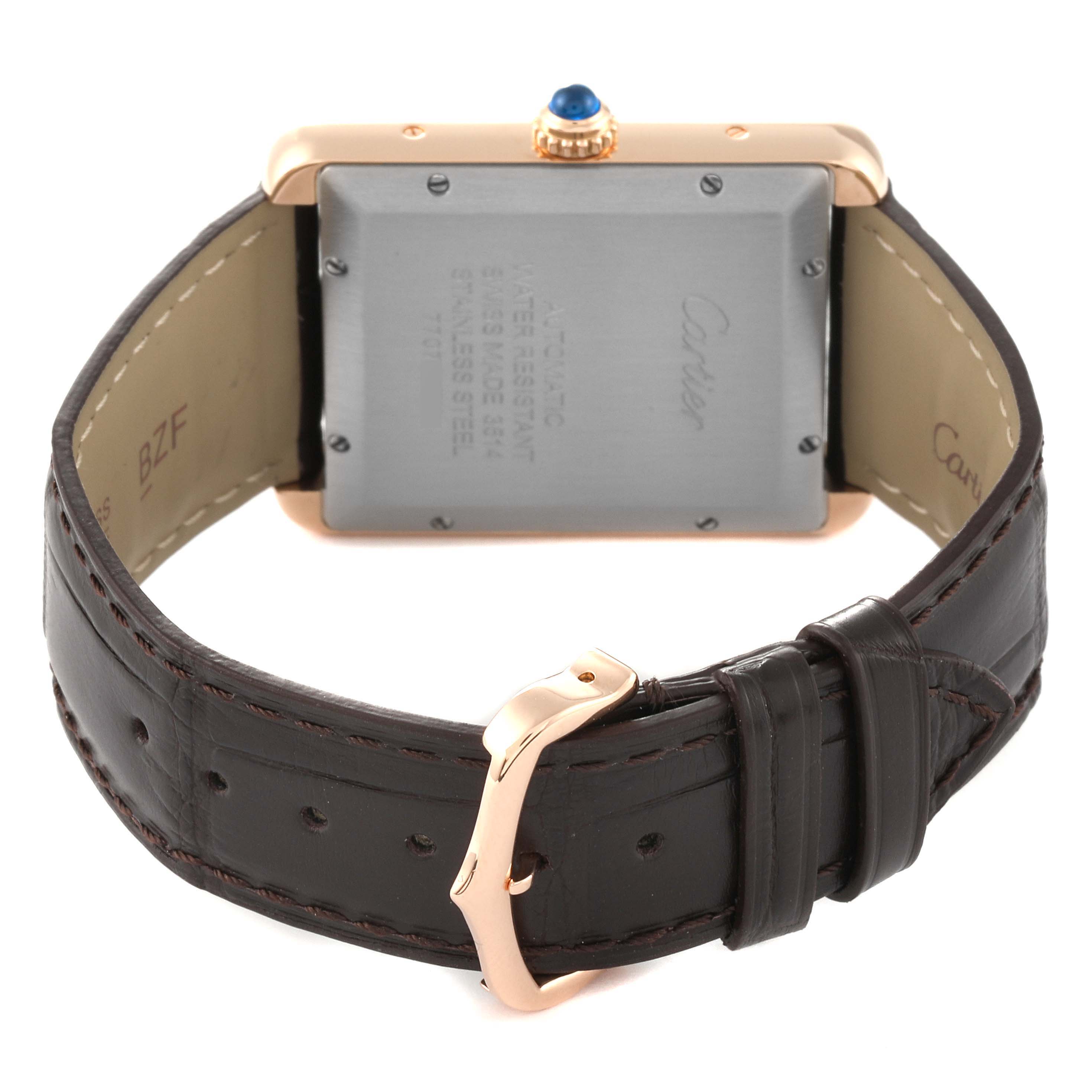 The image shows the back of a Cartier Tank Solo W5200026 Men
s Steel and Gold (two tone) Silver Dial W5200026 Men
s Steel and Gold (two tone) Silver Dial watch, displaying its case back and leather strap with a buckle.