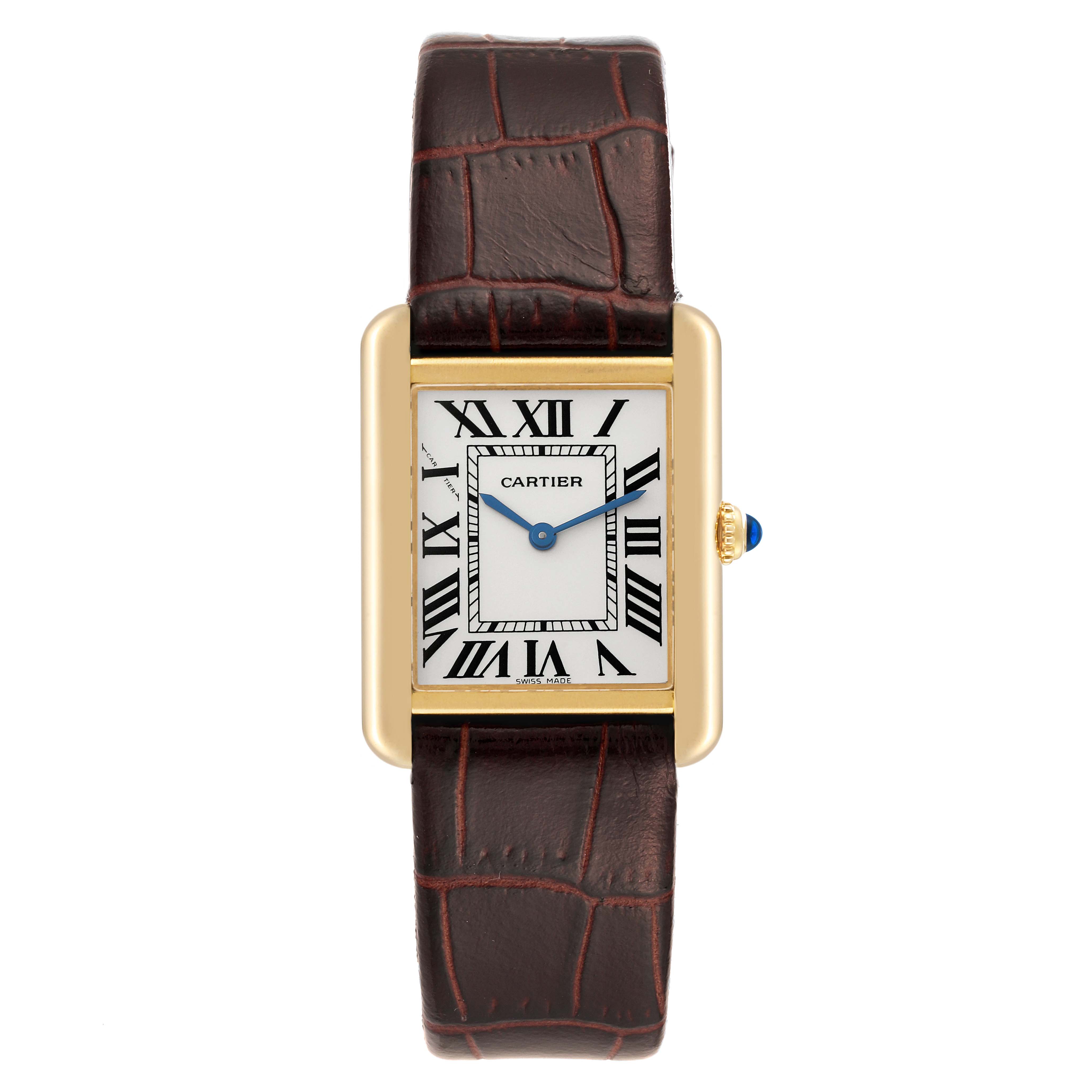 This Cartier Tank Solo W5200002 Women
s Steel and Gold (two tone) Silver Dial W5200002 Women
s Steel and Gold (two tone) Silver Dial watch is shown from the front, displaying its rectangular face and brown leather strap.