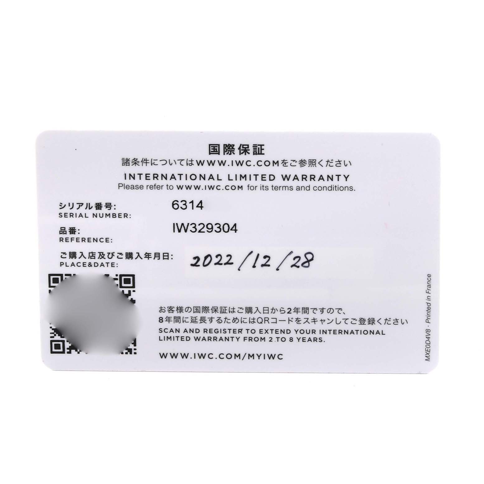 This image shows a warranty card for the IWC Pilot IW329304 Men's Stainless Steel Blue Dial IW329304 Men's Stainless Steel Blue Dial model watch, with serial and reference numbers visible.