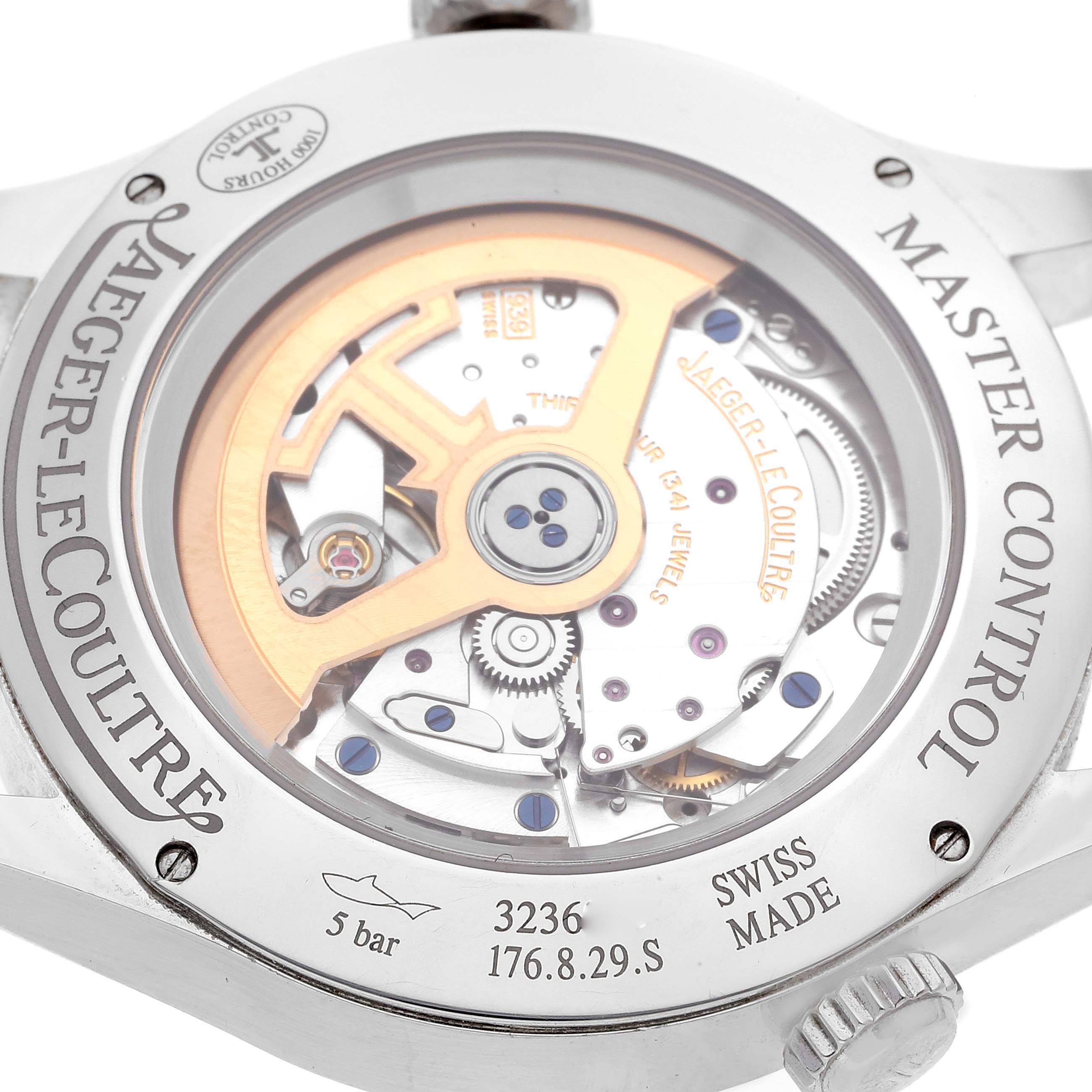 The image shows the back casing and inner mechanical parts of a Jaeger-LeCoultre Master Control watch.