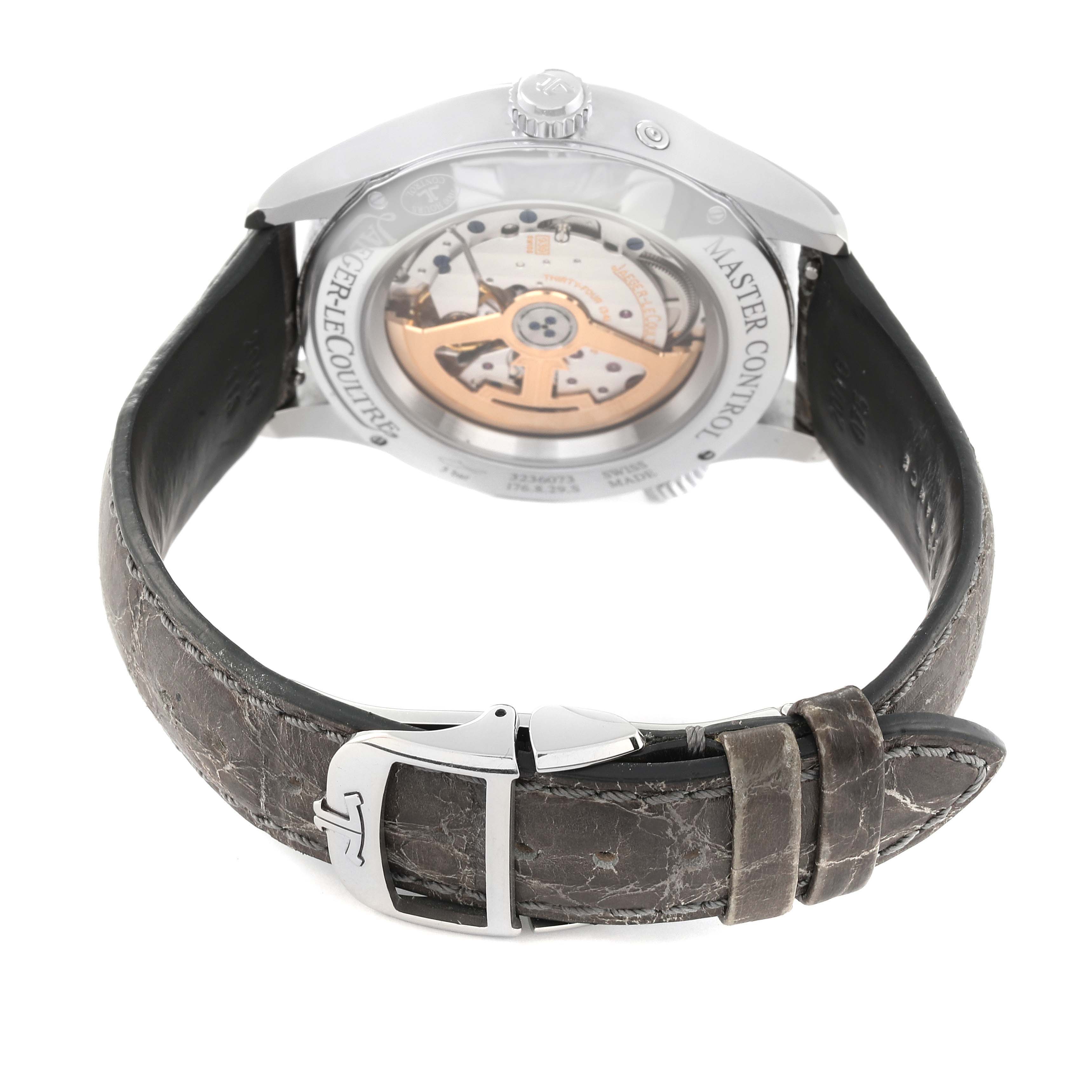 The image shows the rear view of a Jaeger-LeCoultre Master model watch, highlighting its movement and leather strap.