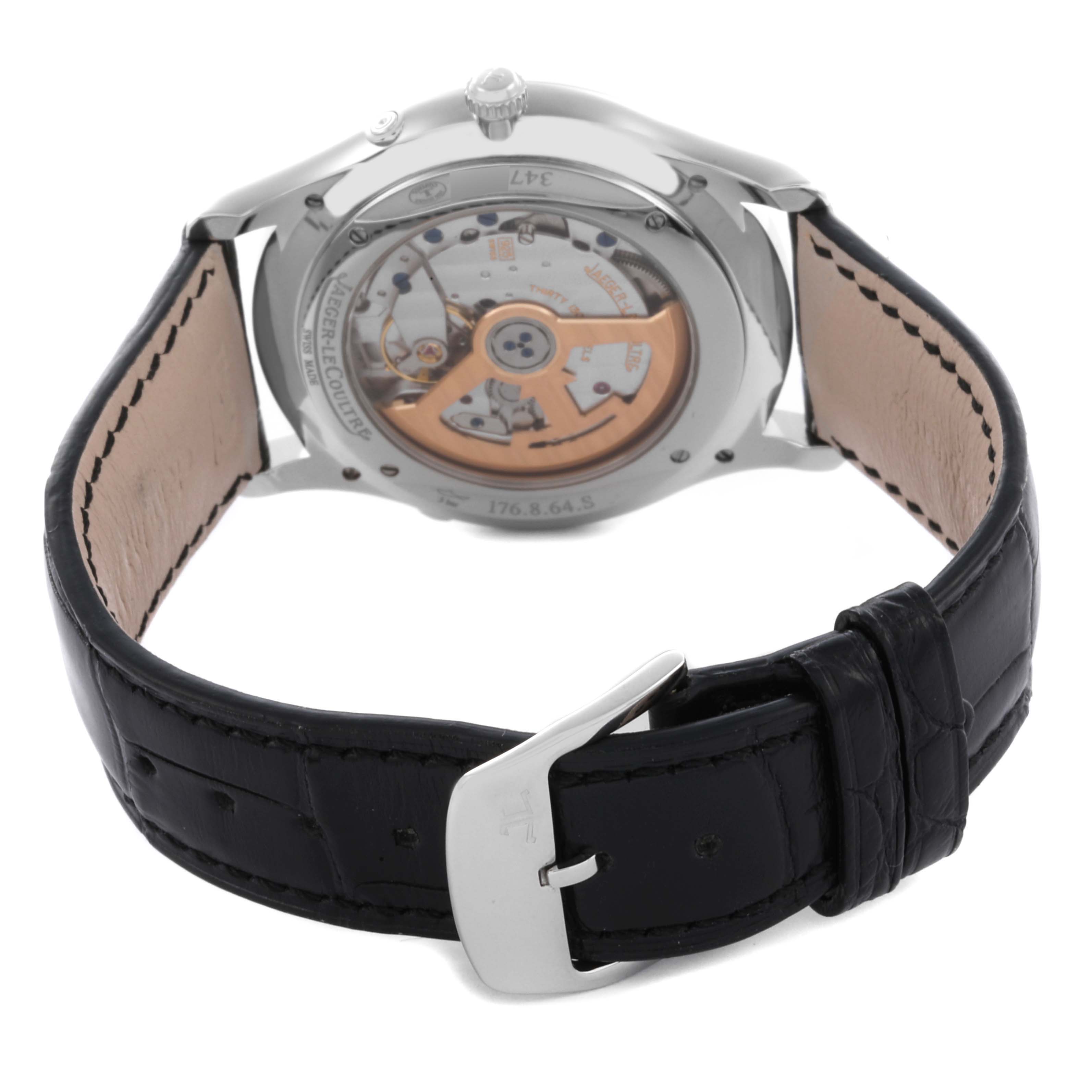 The Jaeger LeCoultre Master Q1368470 Men's Stainless Steel Black Dial Q1368470 Men's Stainless Steel Black Dial watch is shown from the back, focusing on the movement and leather strap.