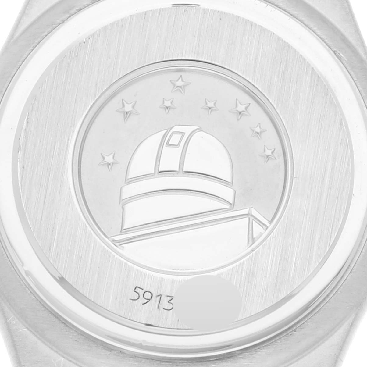 This image shows the back case of the Omega 1267.75.00 Women
s Steel and Gold (two tone) Mother of Pearl Dial 1267.75.00 Women
s Steel and Gold (two tone) Mother of Pearl Dial Constellation 95 Mother Of Pearl Diamond Yellow Gold Steel Ladies Watch 1267.75.00 model.