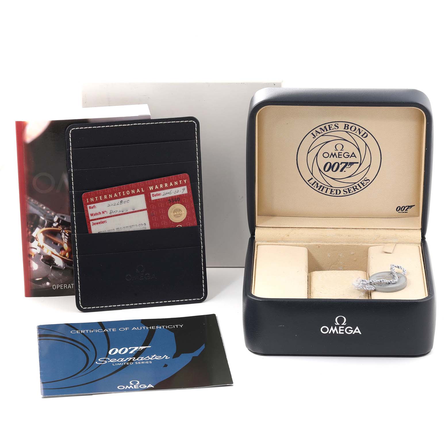 The image shows the Omega Seamaster 2226.80.00 Men's Stainless Steel Blue Dial 2226.80.00 Men's Stainless Steel Blue Dial watch box, international warranty card, authenticity certificate, and operation manual.