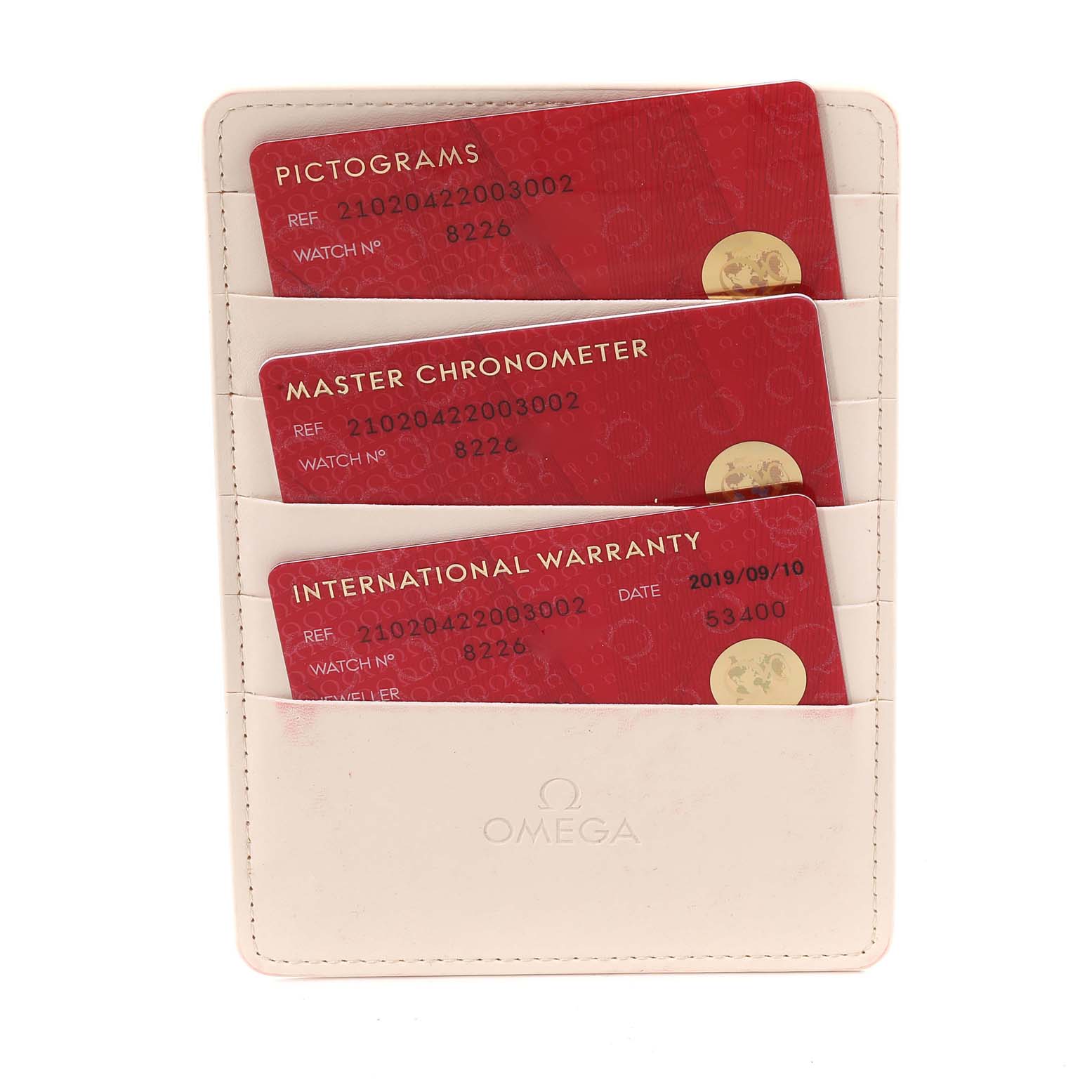The image shows three warranty and certification cards in a holder for an Omega Seamaster 210.20.42.20.03.002 Men's Steel and Gold (two tone) Blue Dial 210.20.42.20.03.002 Men's Steel and Gold (two tone) Blue Dial watch.