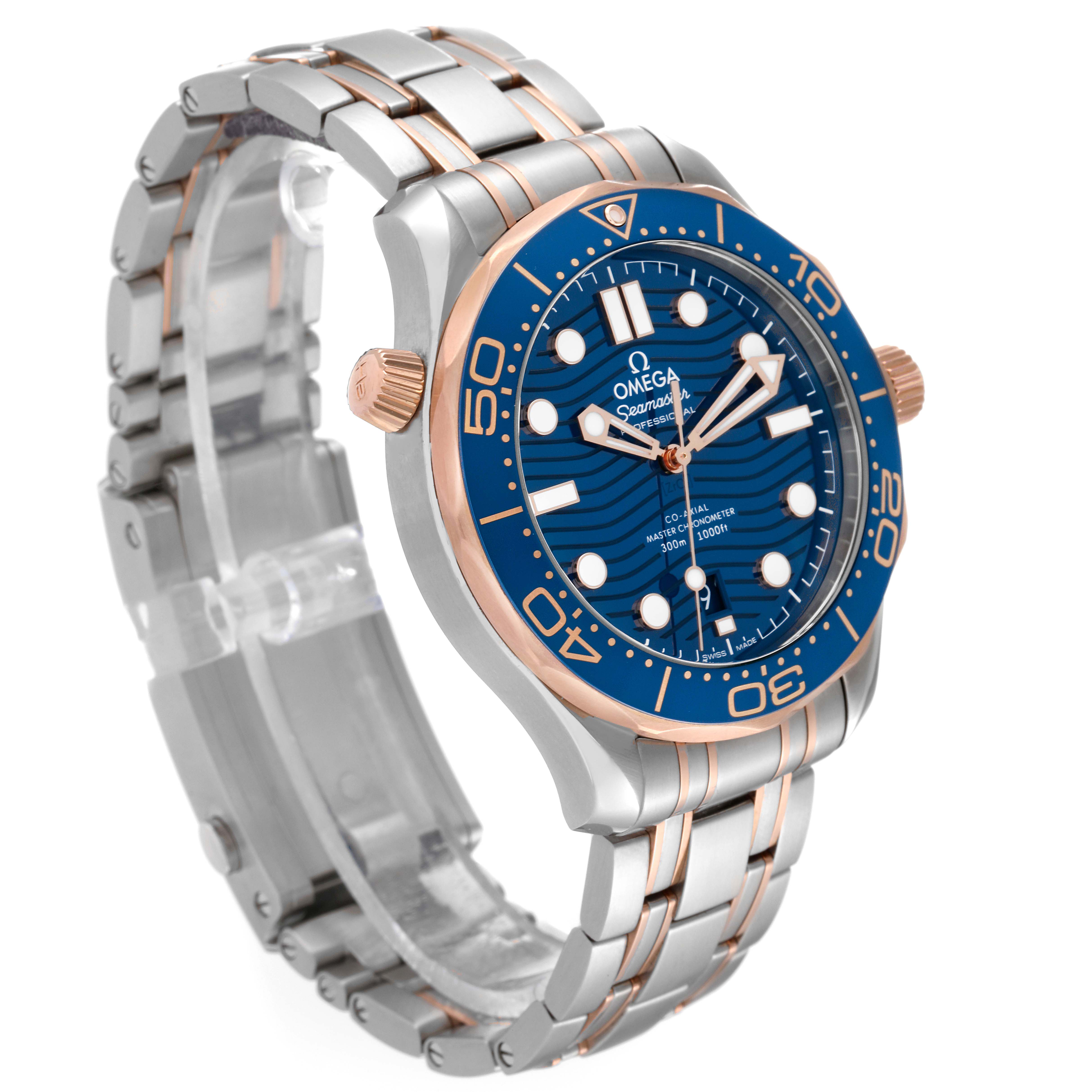 The image shows a side angle of an Omega Seamaster 210.20.42.20.03.002 Men's Steel and Gold (two tone) Blue Dial 210.20.42.20.03.002 Men's Steel and Gold (two tone) Blue Dial watch, highlighting its blue dial, bezel, and stainless steel bracelet with rose gold accents.