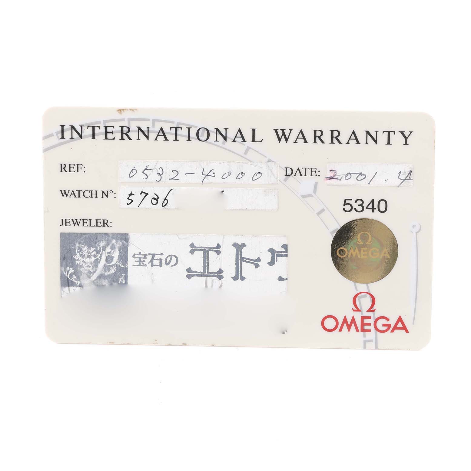 The image shows an Omega Speedmaster 3517.30.00 Men's Stainless Steel Silver Dial 3517.30.00 Men's Stainless Steel Silver Dial International Warranty card with reference number, watch number, date, and jeweler details.