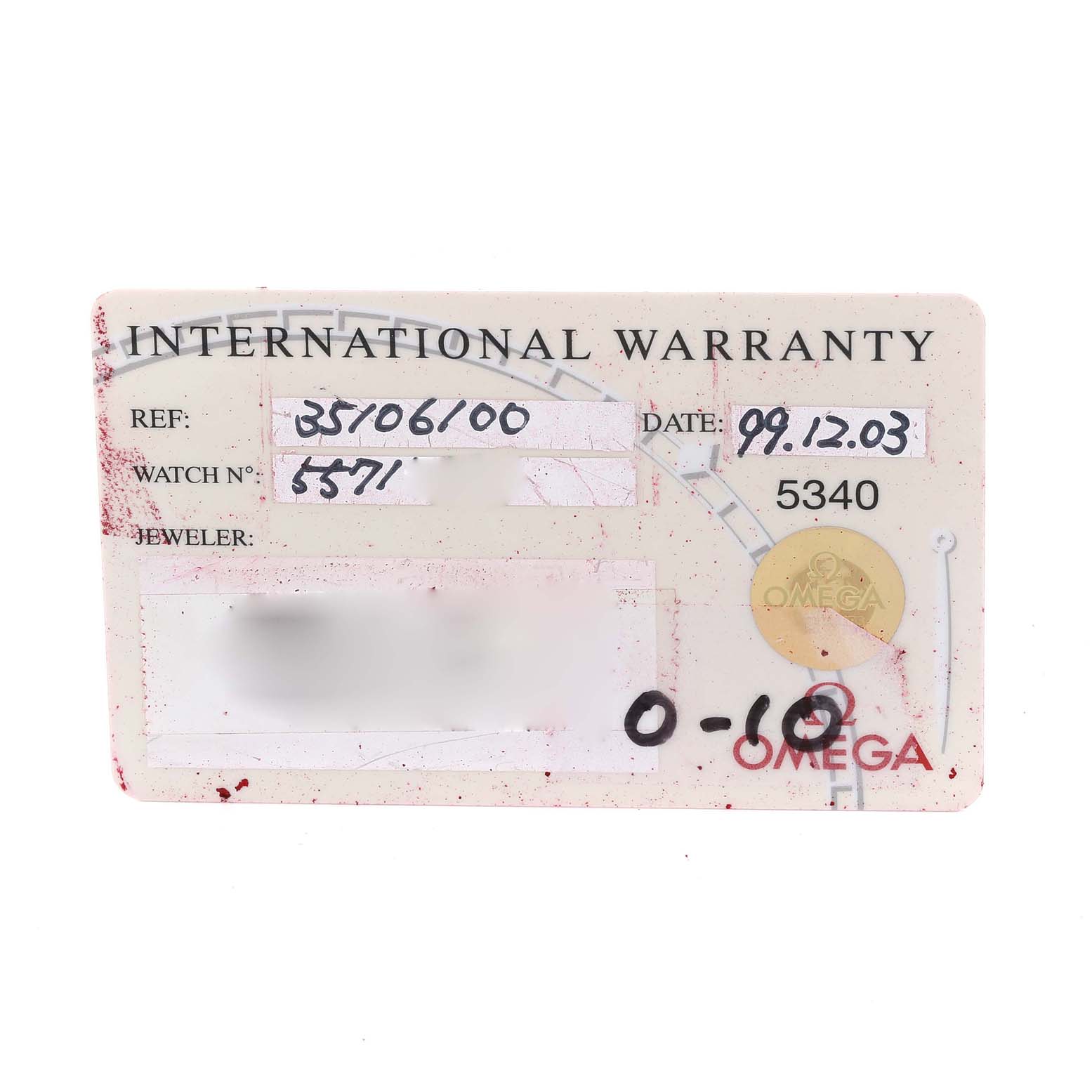 The image shows an International Warranty card for the Omega Speedmaster 3510.61.00 Men
s Stainless Steel Red Dial 3510.61.00 Men
s Stainless Steel Red Dial model watch.