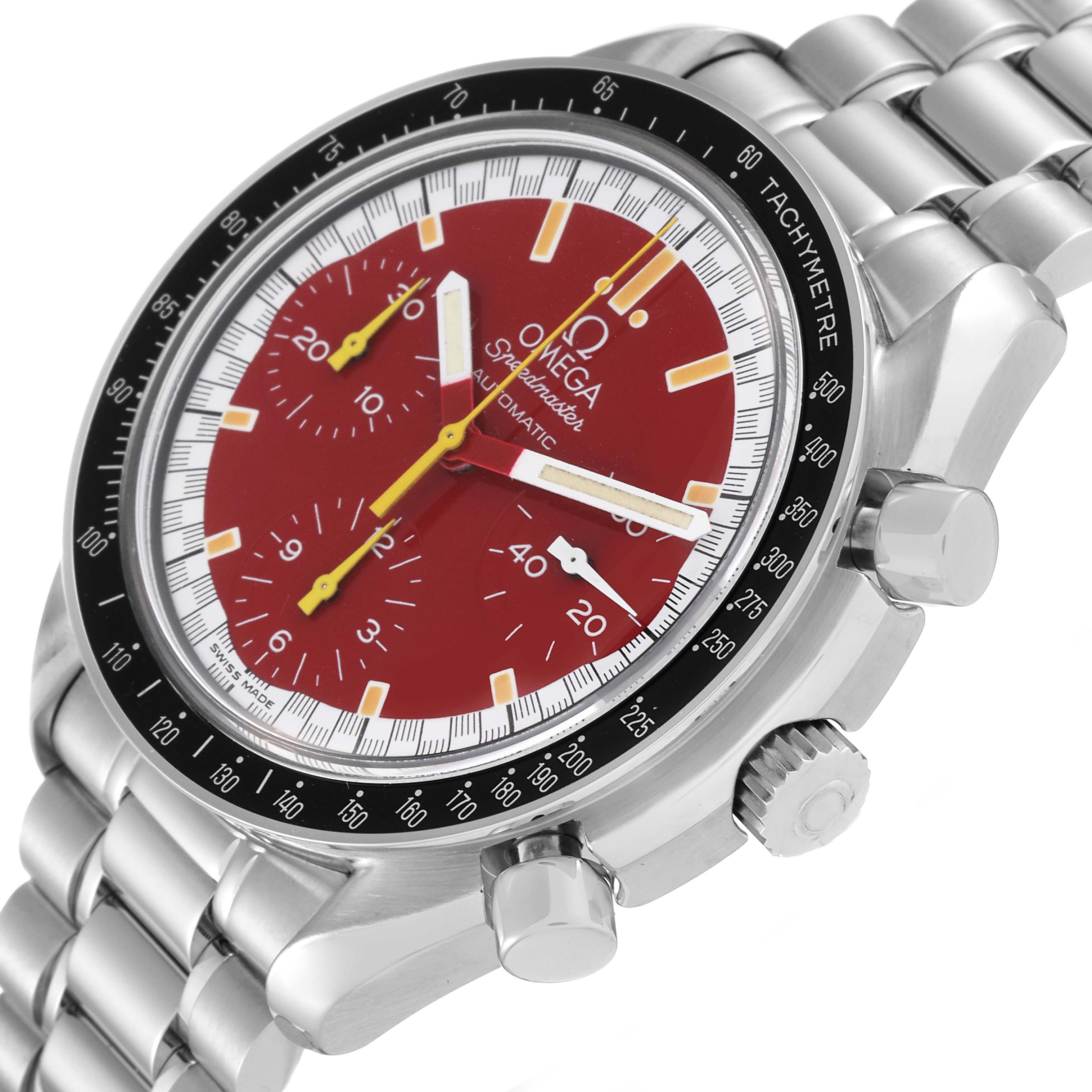 The image shows an angled view of an Omega Speedmaster 3510.61.00 Men
s Stainless Steel Red Dial 3510.61.00 Men
s Stainless Steel Red Dial watch, highlighting the red dial, tachymeter bezel, and stainless steel bracelet.