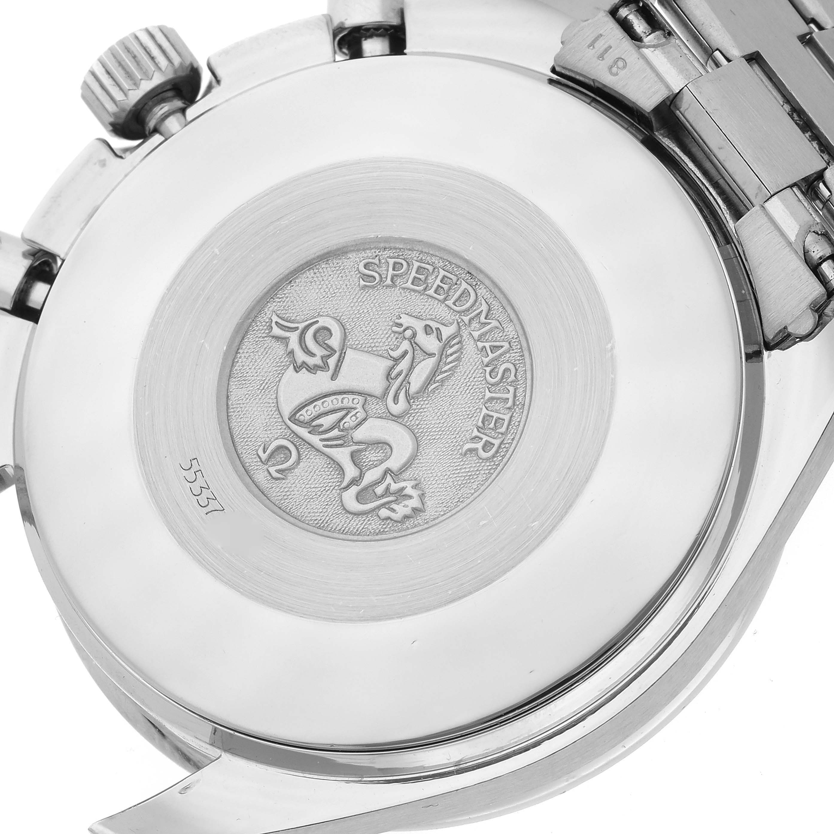 The image shows the back case of an Omega Speedmaster 3510.12.00 Men's Stainless Steel Yellow Dial 3510.12.00 Men's Stainless Steel Yellow Dial watch, highlighting its engraved emblem and part of the bracelet.