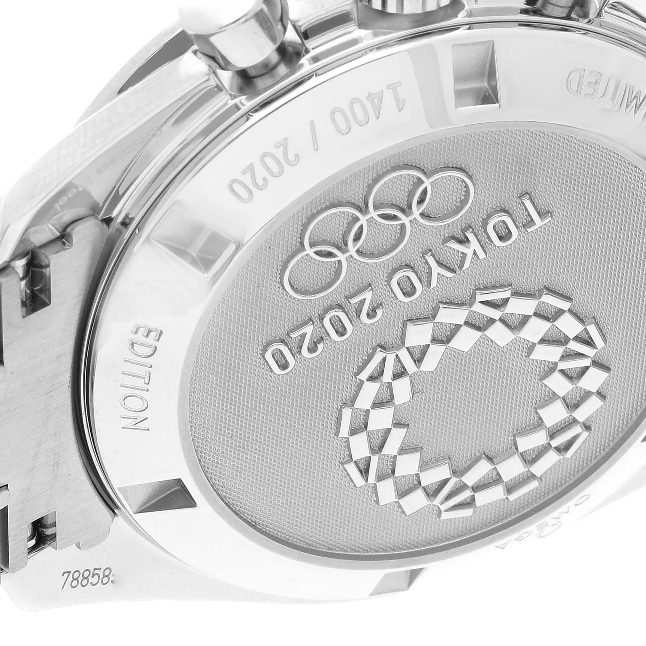 The image shows the case back of an Omega Speedmaster 522.30.42.30.06.001 Men's Stainless Steel Silver Dial 522.30.42.30.06.001 Men's Stainless Steel Silver Dial watch, featuring a Tokyo 2020 engraving.