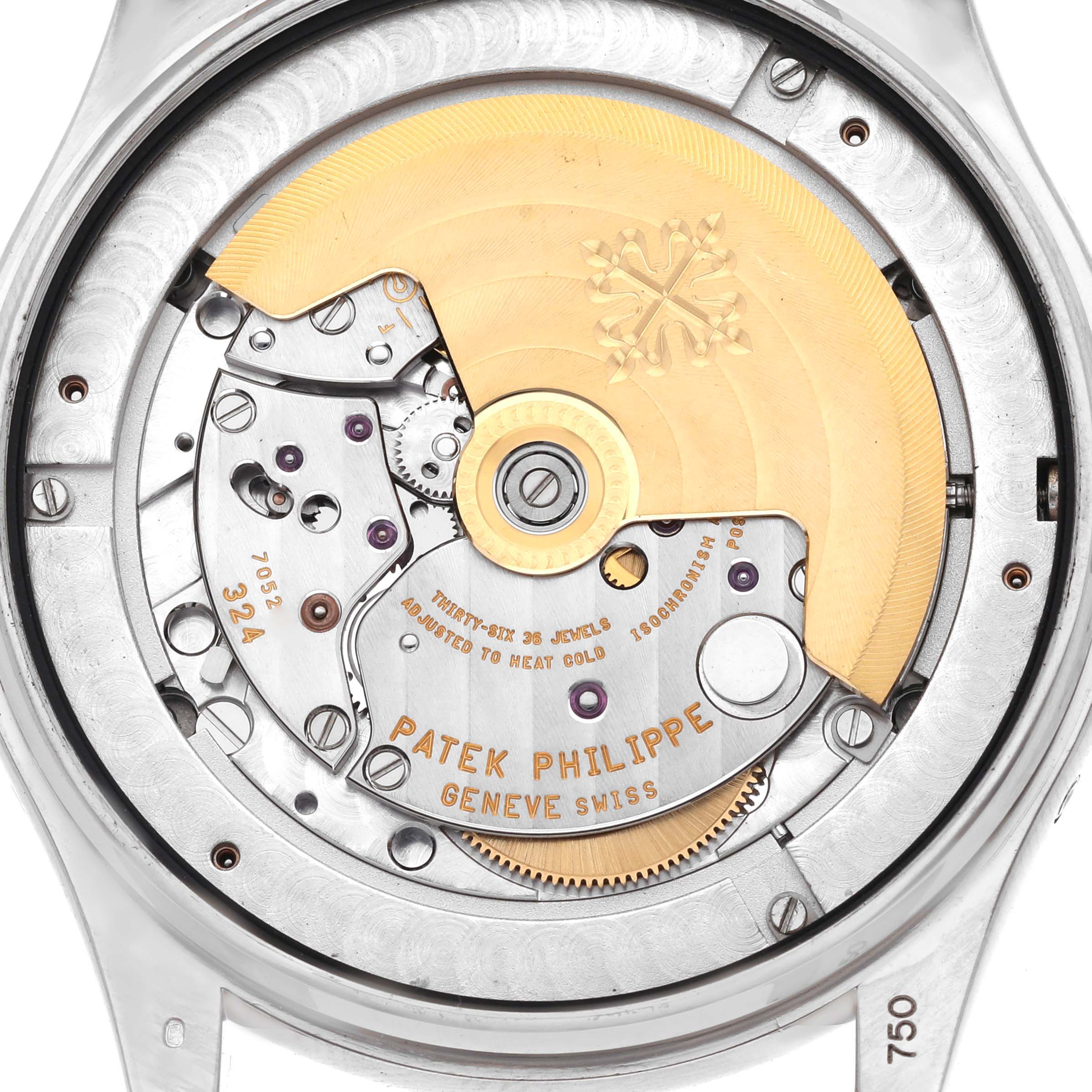 The image shows the back view of the Patek Philippe Complications 5146G Men's White Gold Grey Dial 5146G Men's White Gold Grey Dial watch, highlighting the movement and rotor.