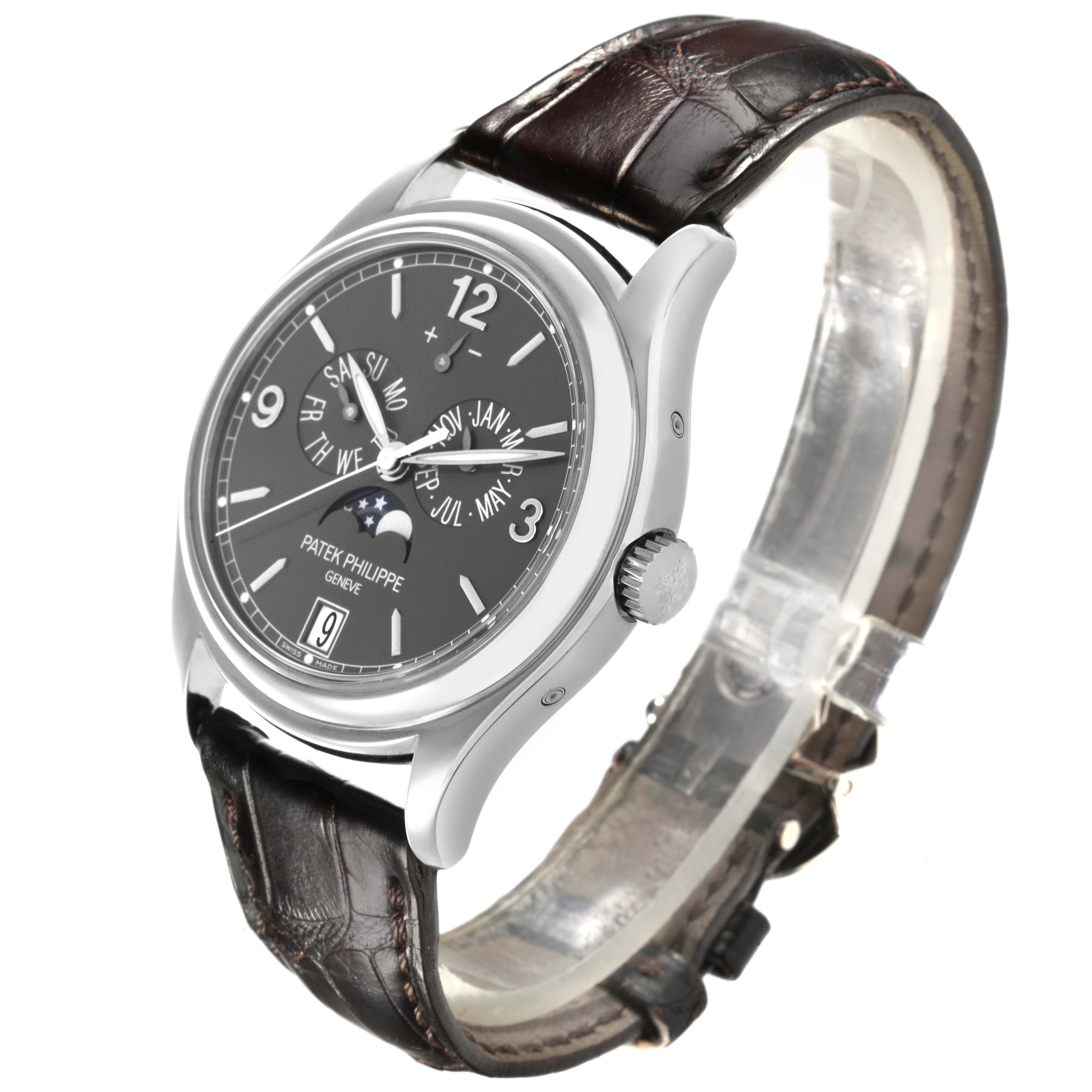 The Patek Philippe Complications 5146G Men's White Gold Grey Dial 5146G Men's White Gold Grey Dial watch is shown at a three-quarter angle, displaying the case, dial, crown, and strap.