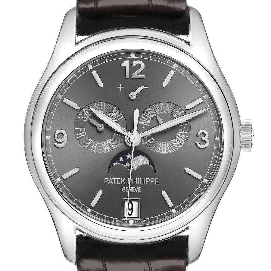 The Patek Philippe Complications watch is shown from the front, displaying the dial, moon phase, and calendar subdials.