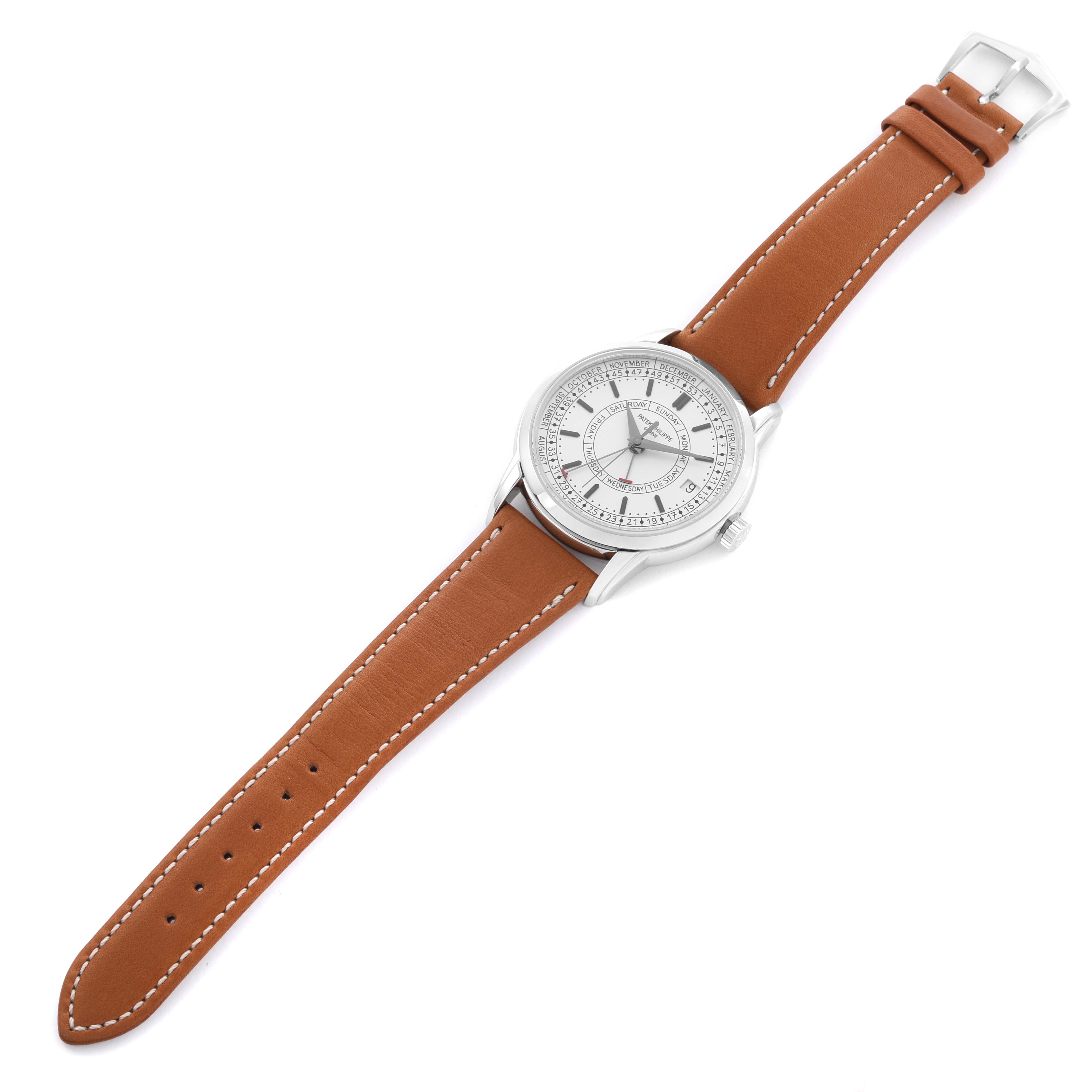 The Patek Philippe Complications 5212A-001 Men's Stainless Steel Silver Dial 5212A-001 Men's Stainless Steel Silver Dial watch is shown from an angled top view, displaying the face, bezel, and brown leather strap.