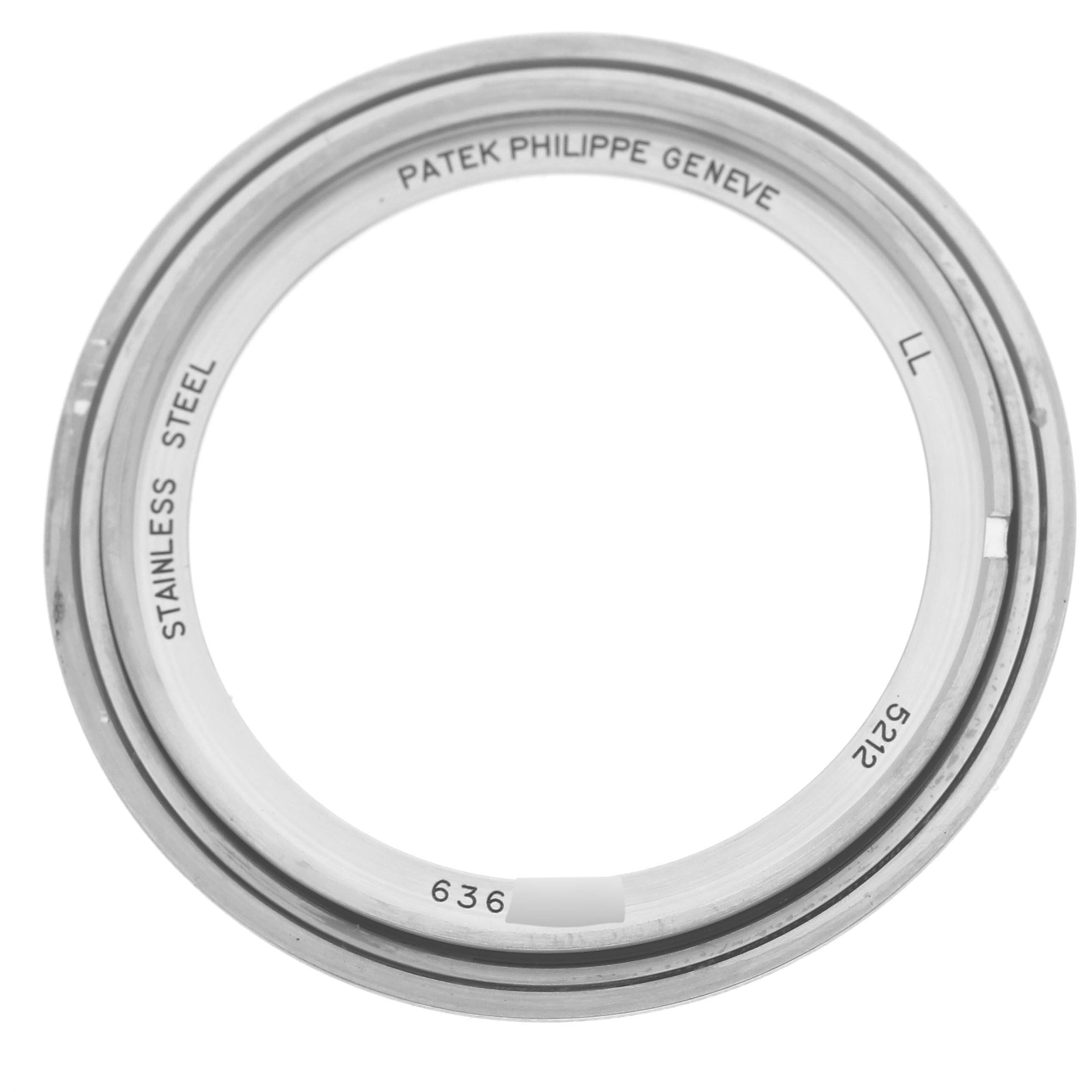 The image shows a stainless steel bezel for a Patek Philippe Complications 5212A-001 Men's Stainless Steel Silver Dial 5212A-001 Men's Stainless Steel Silver Dial model, viewed from above.