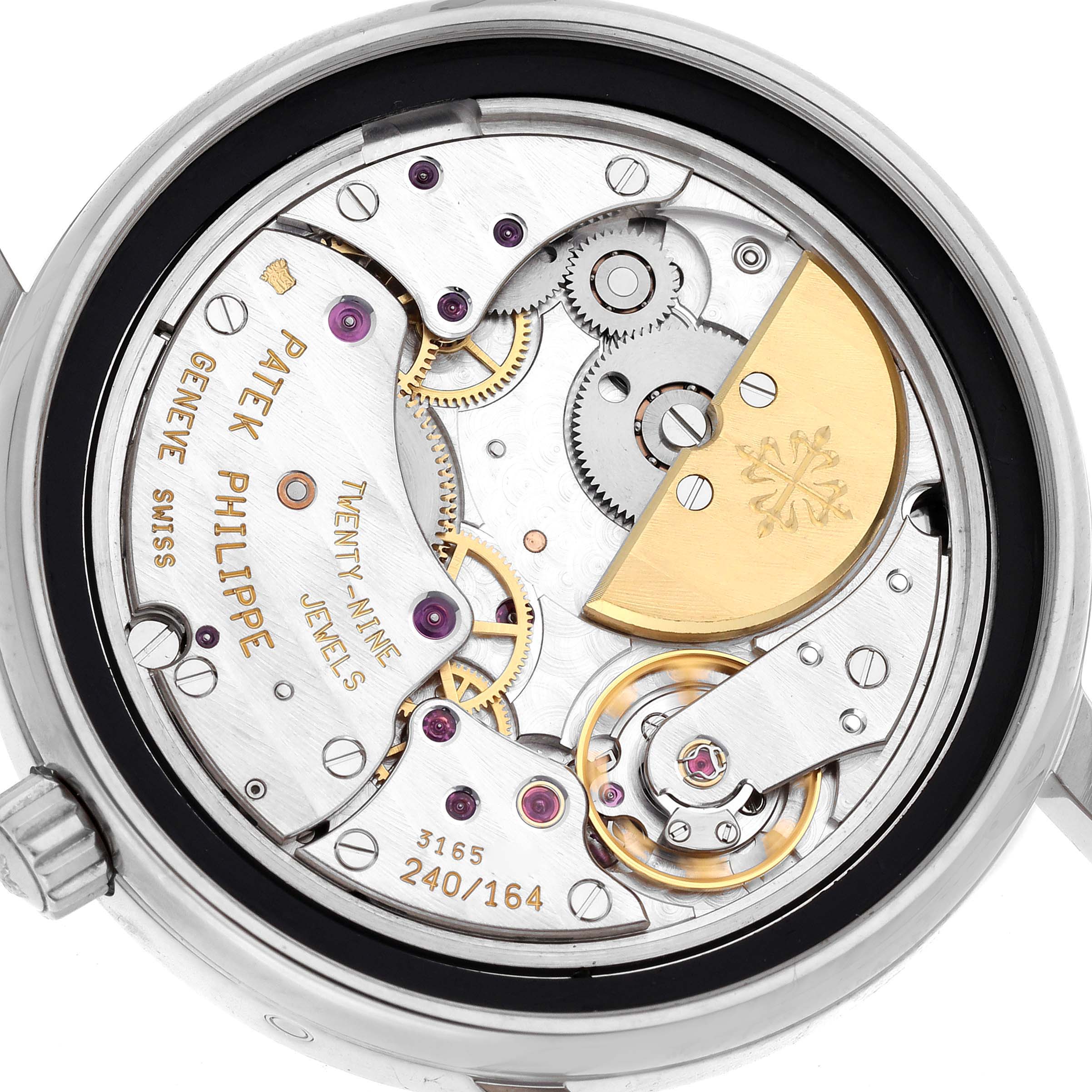 This image shows the intricate movement and mechanism of the Patek Philippe Complications 5055G-001 Men's White Gold Black Dial 5055G-001 Men's White Gold Black Dial model from a back view.