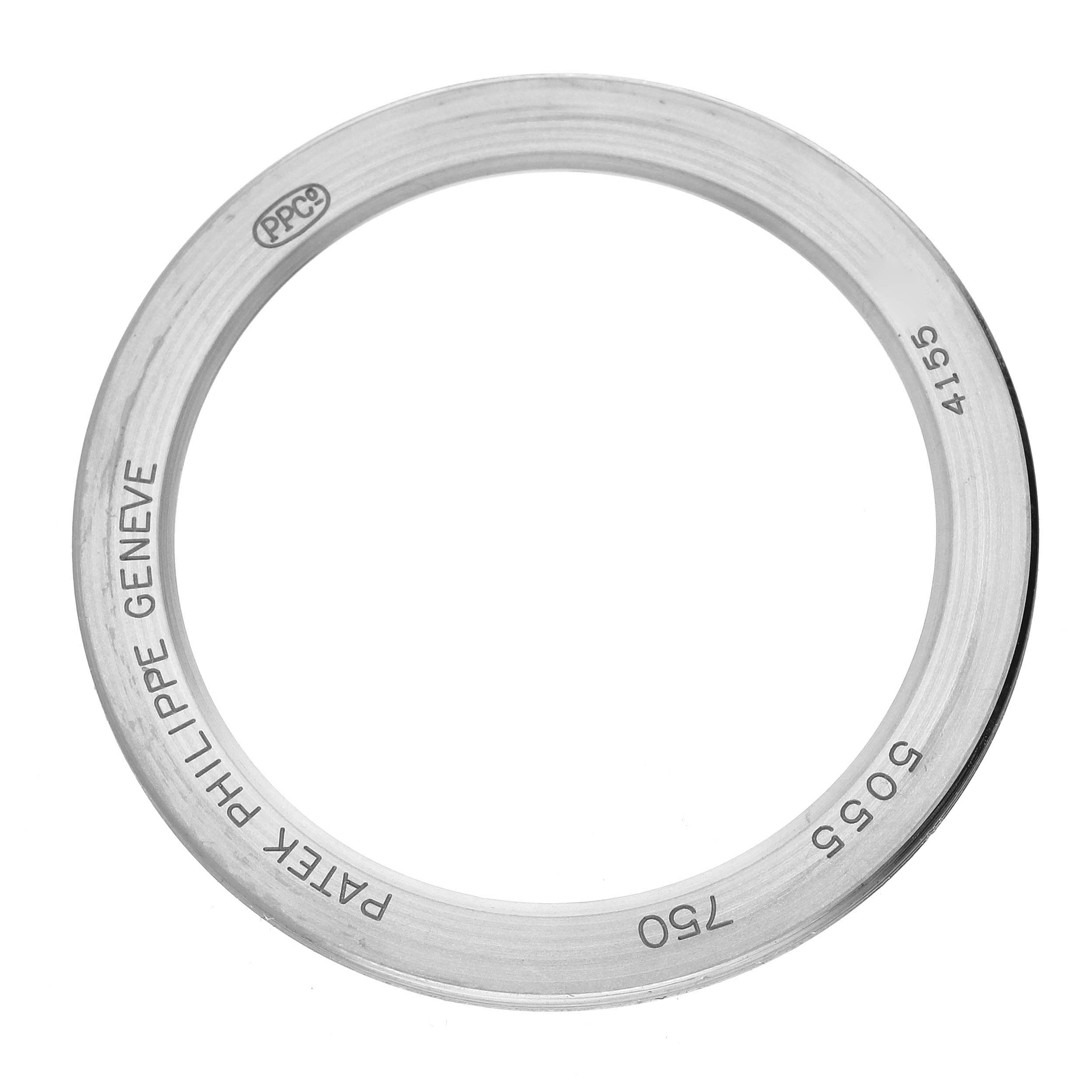 The image shows a top-down view of a bezel for a Patek Philippe Complications 5055G-001 Men's White Gold Black Dial 5055G-001 Men's White Gold Black Dial model.