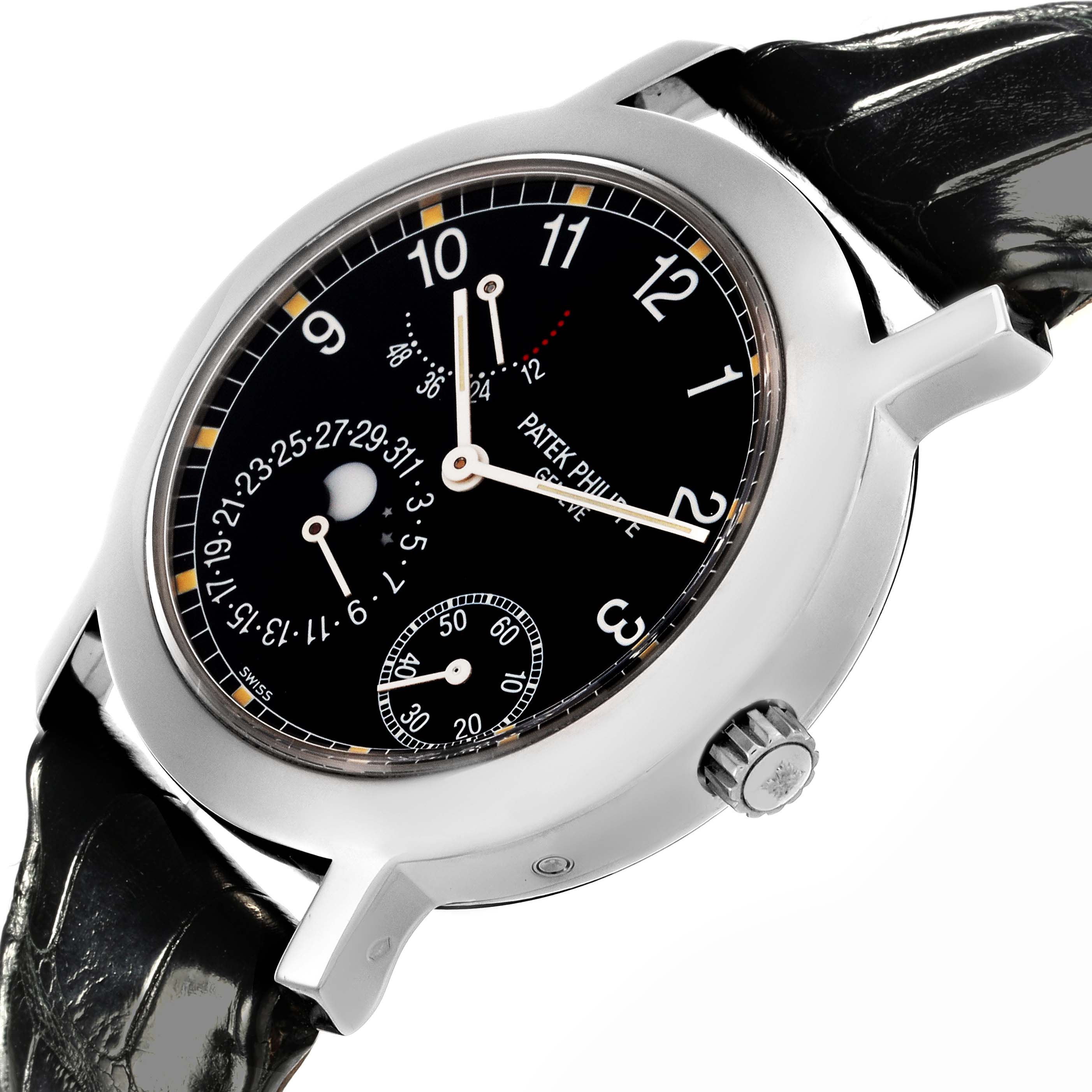 The Patek Philippe Complications 5055G-001 Men's White Gold Black Dial 5055G-001 Men's White Gold Black Dial watch is shown at a side angle, displaying the dial, crown, and leather strap.