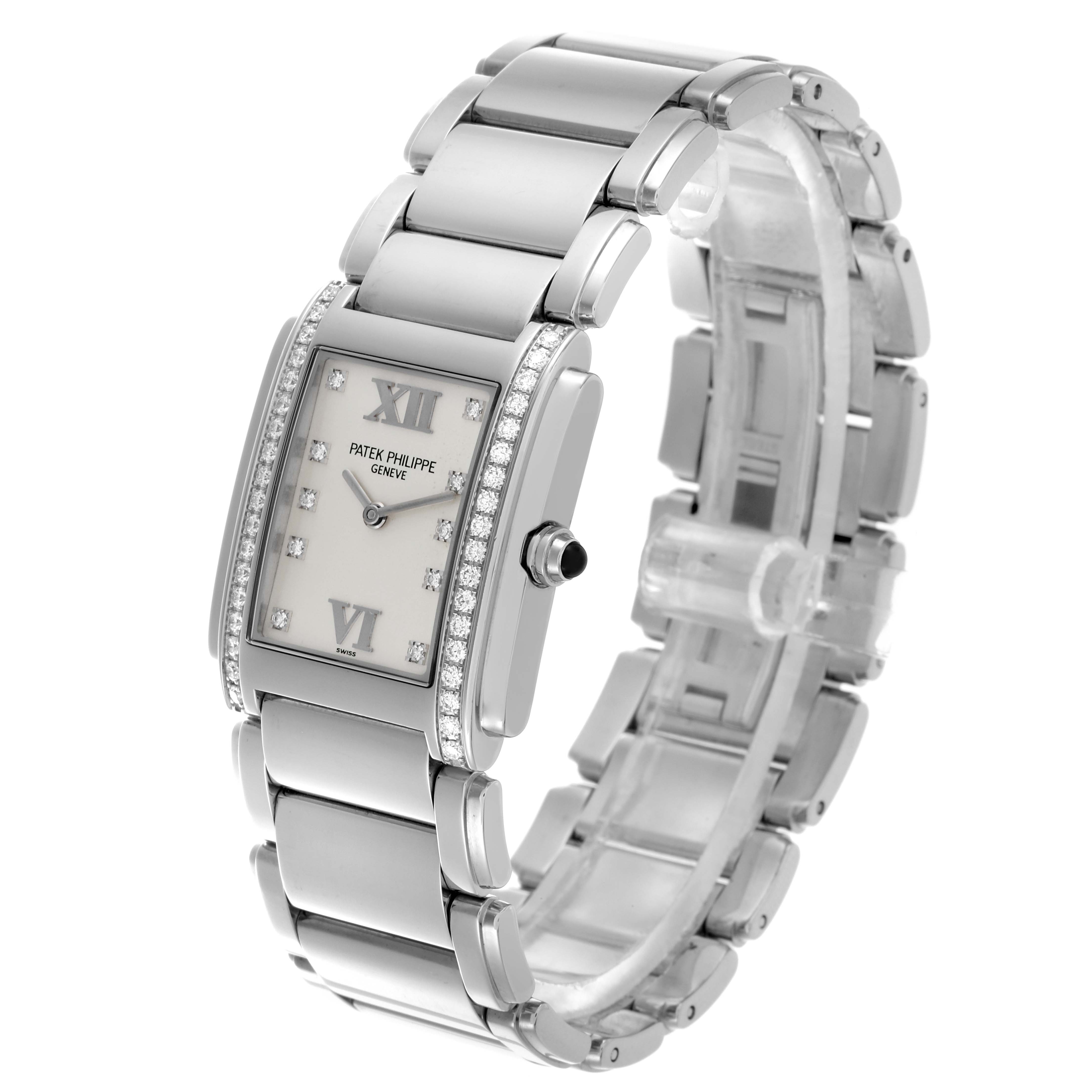The Patek Philippe Twenty-4 4910/10A-011 Women's Stainless Steel Silver Dial 4910/10A-011 Women's Stainless Steel Silver Dial watch is shown at an angle displaying the face, side, and bracelet links.
