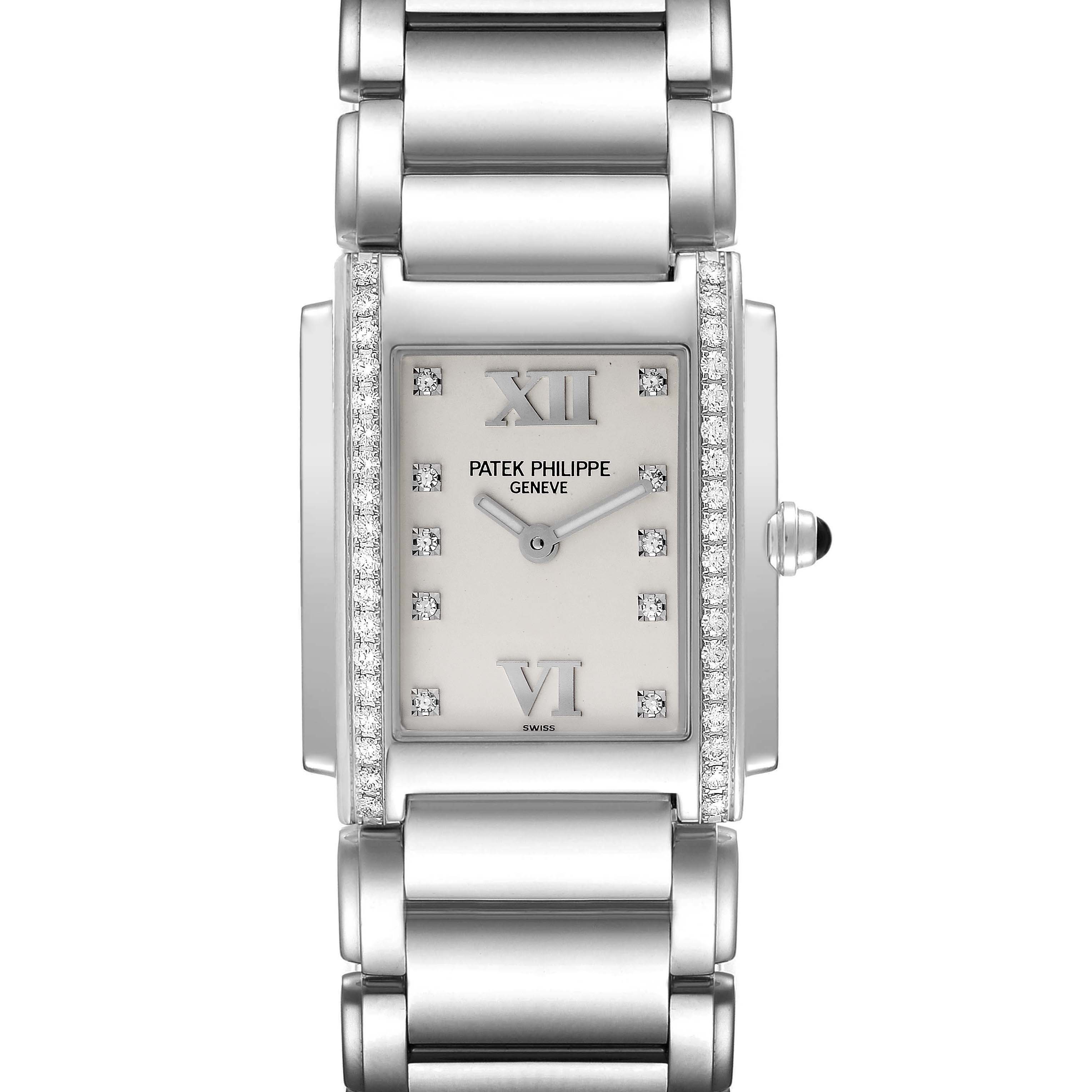 The Patek Philippe Twenty-4 4910/10A-011 Women's Stainless Steel Silver Dial 4910/10A-011 Women's Stainless Steel Silver Dial watch is shown from a front view featuring the dial, bracelet, and part of the crown.