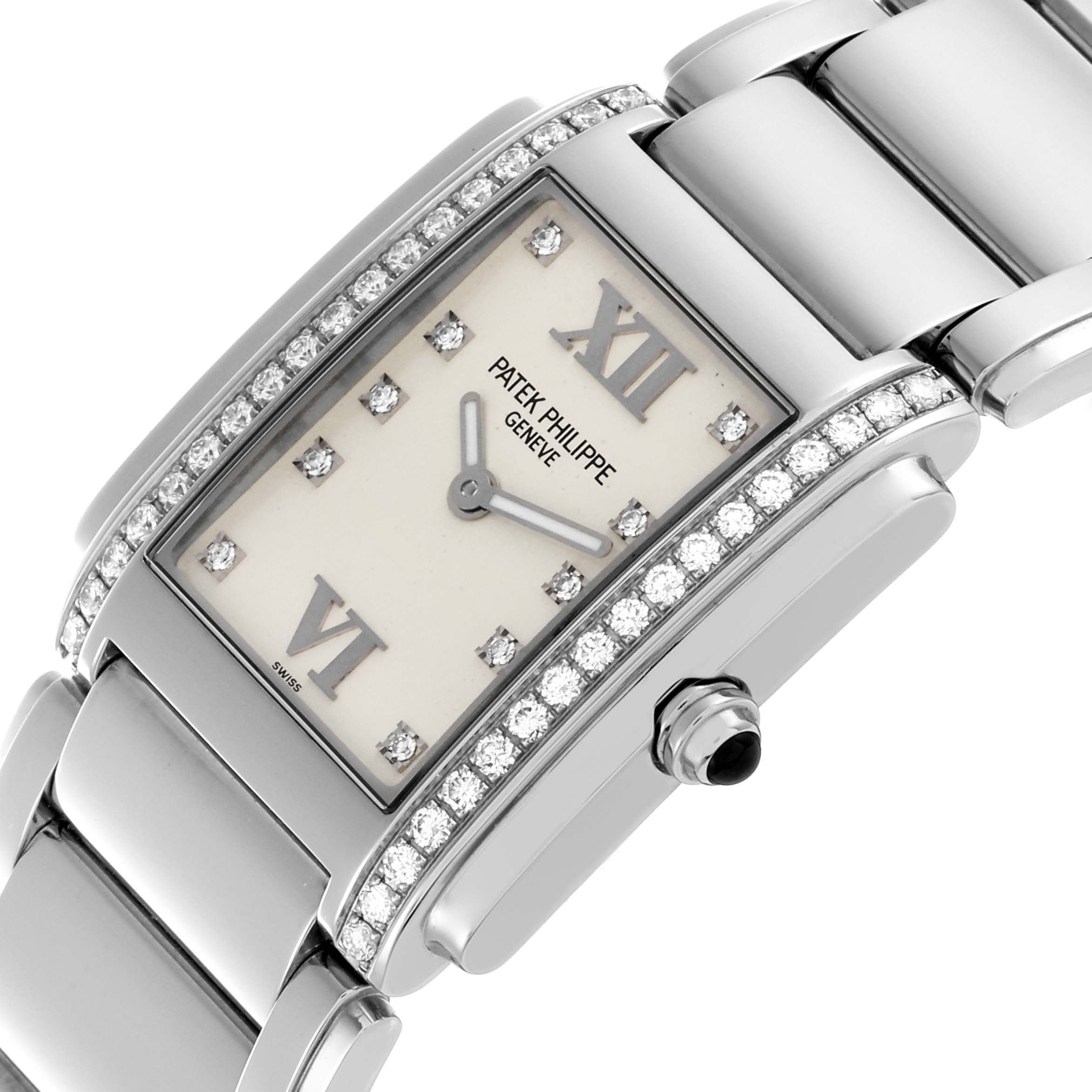 The Patek Philippe Twenty-4 4910/10A-011 Women's Stainless Steel Silver Dial 4910/10A-011 Women's Stainless Steel Silver Dial watch is shown in a close-up side angle, highlighting the face, bracelet, and diamond-studded bezel.