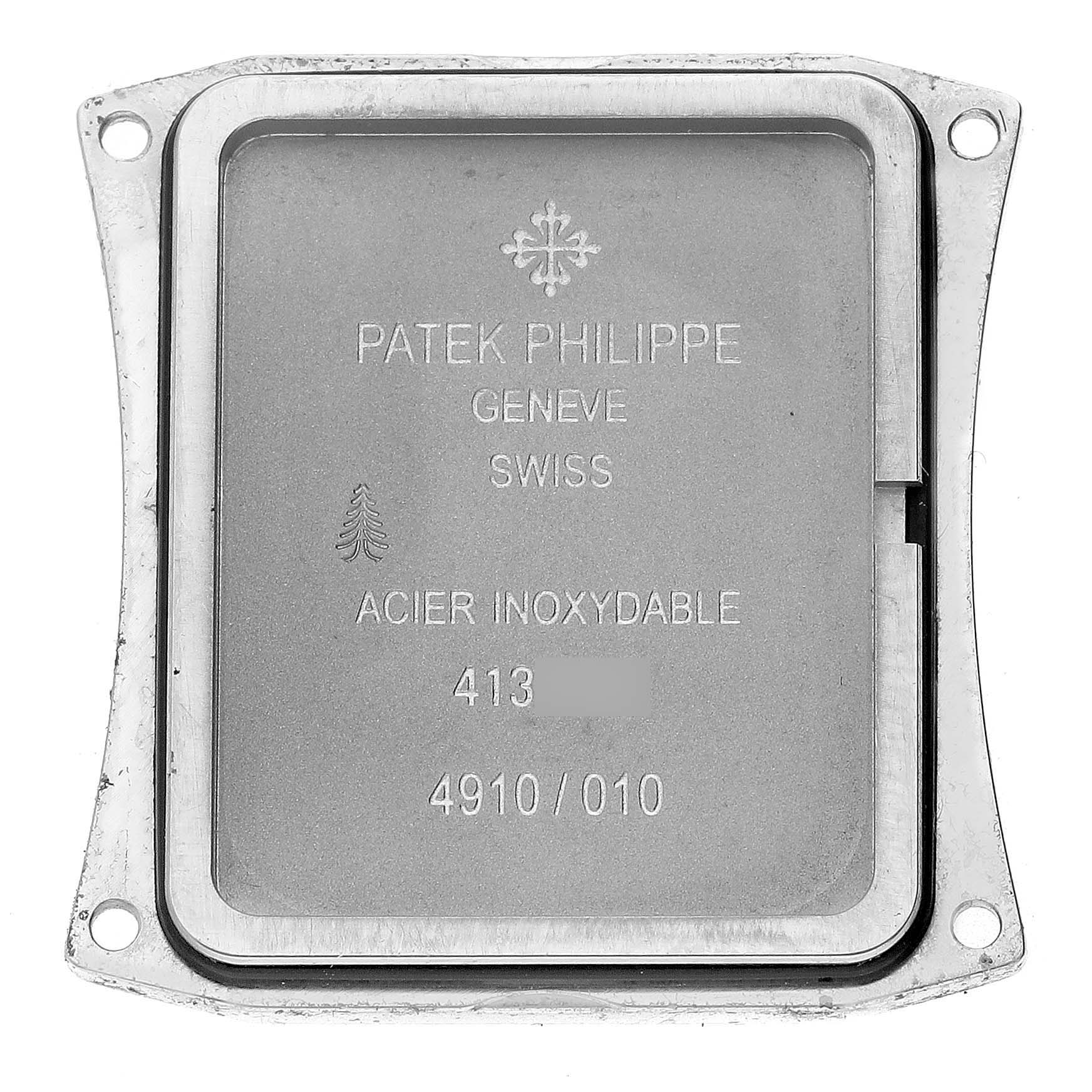 The image shows the back plate of a Patek Philippe Twenty-4 4910/10A-011 Women's Stainless Steel Silver Dial 4910/10A-011 Women's Stainless Steel Silver Dial watch, detailing materials and serial numbers.
