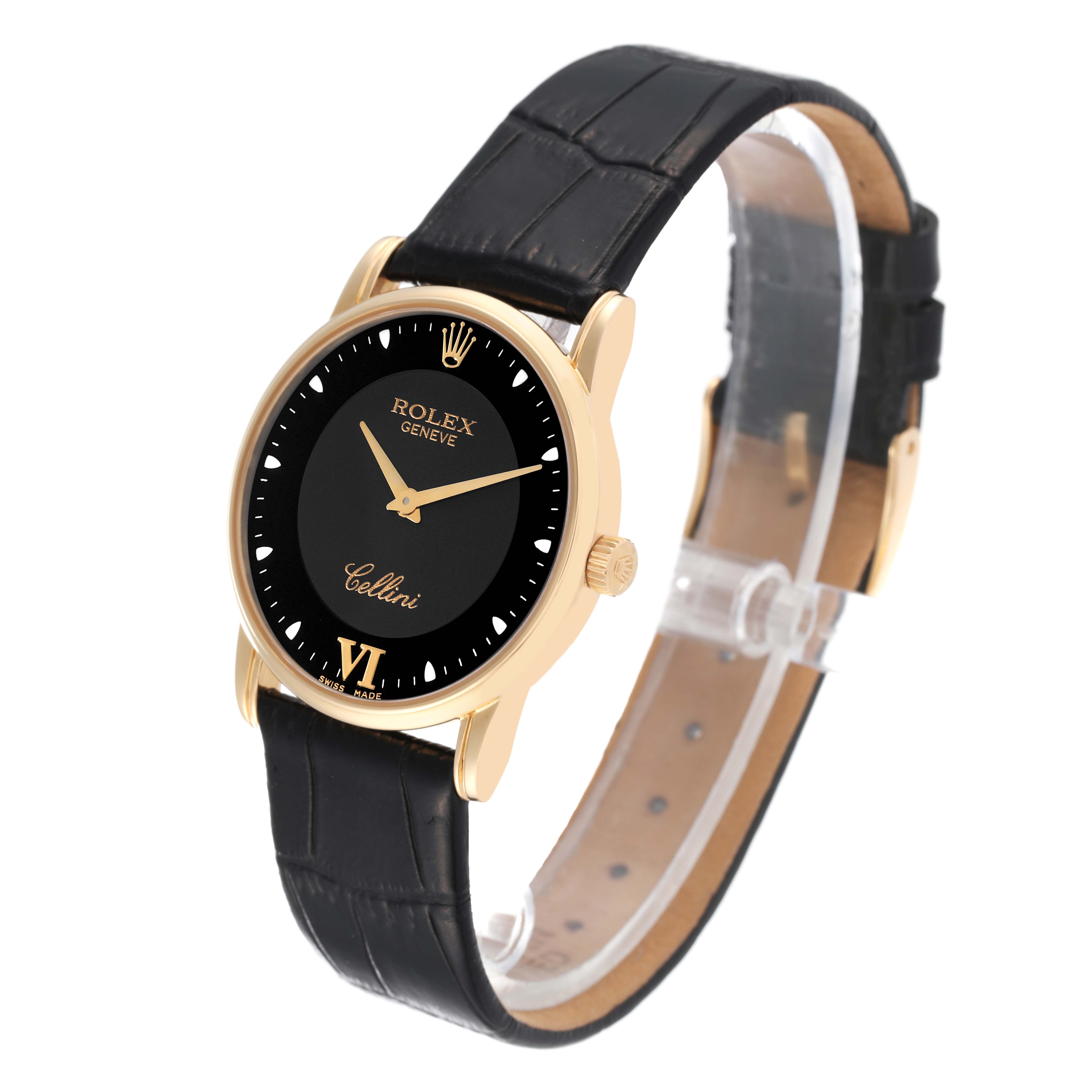 The Rolex Cellini 5116 Men's Yellow Gold Black Dial 5116 Men's Yellow Gold Black Dial watch is angled slightly from the side showing its black dial, gold case, and black leather strap.
