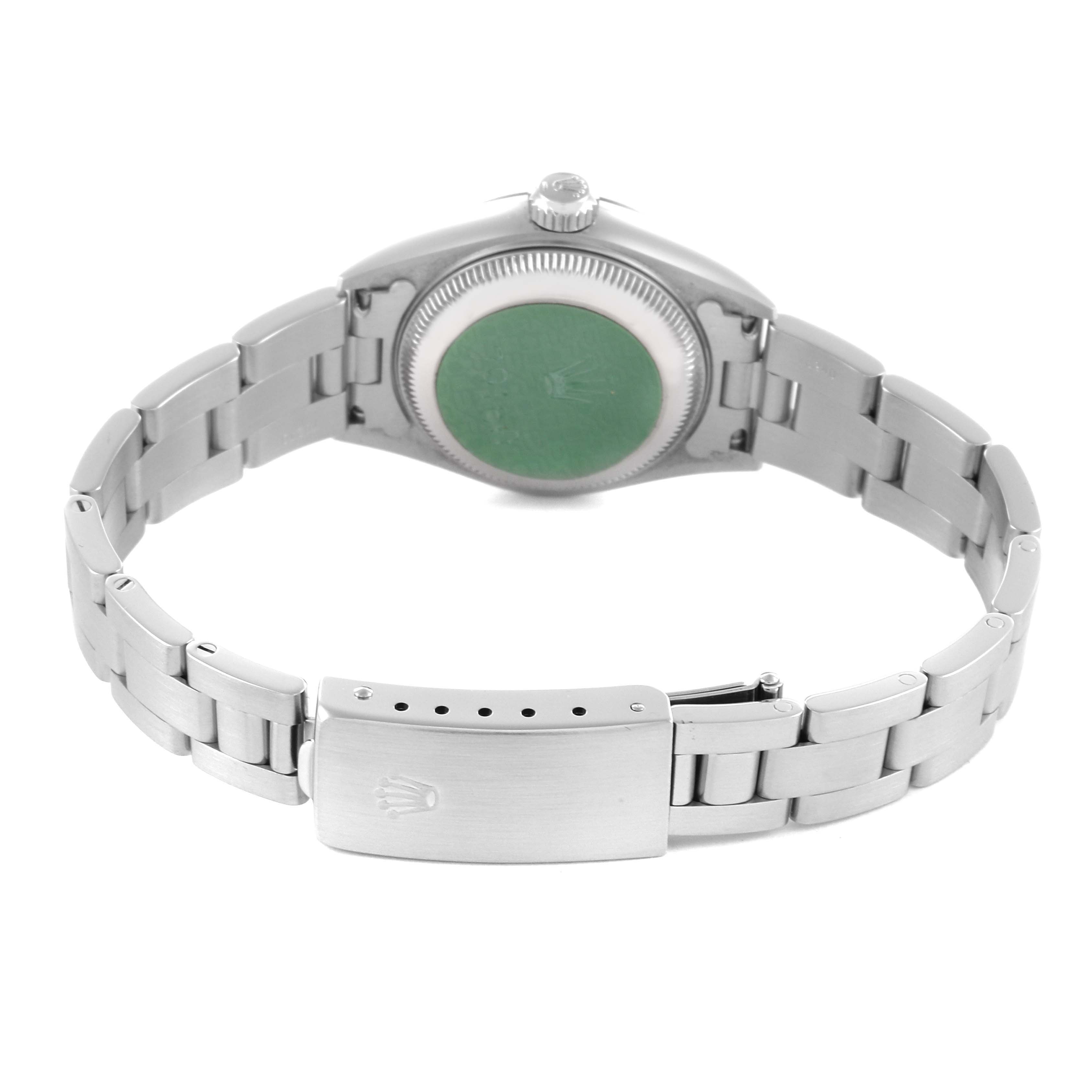 The Rolex Date 79160 Women's Stainless Steel Pink Dial 79160 Women's Stainless Steel Pink Dial model watch is shown from the back, displaying the case back and bracelet clasp.