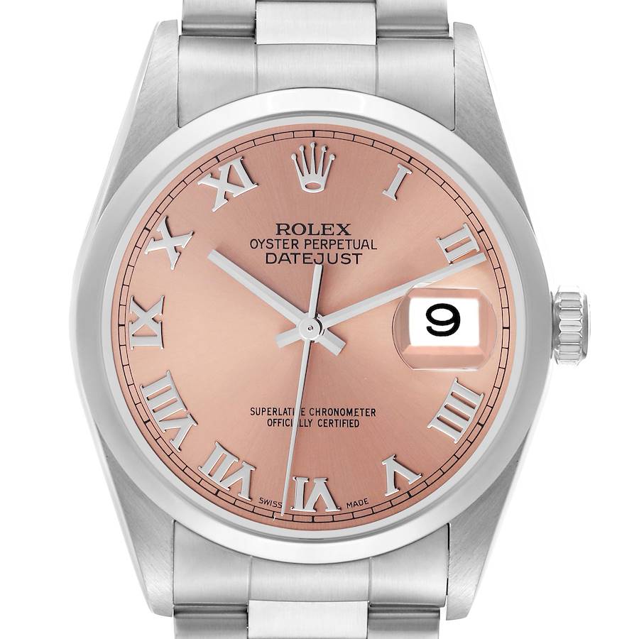 The image shows a front view of a Rolex Datejust watch, highlighting its pink dial and date window.