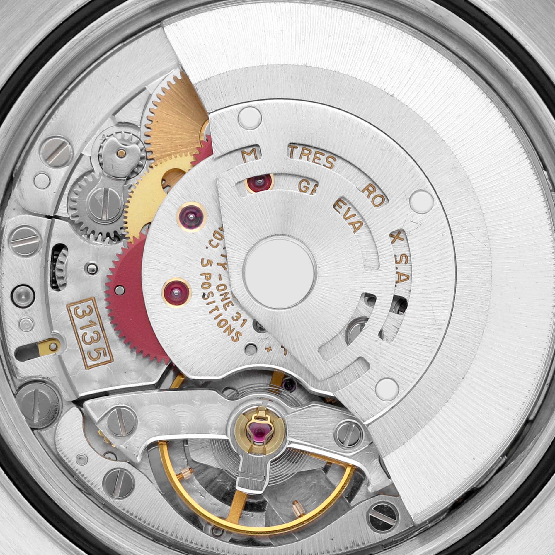 The image shows an up-close view of the Rolex Datejust 16233 Men's Steel and Gold (two tone) Champagne Dial 16233 Men's Steel and Gold (two tone) Champagne Dial watch's movement, revealing gears and mechanical components.