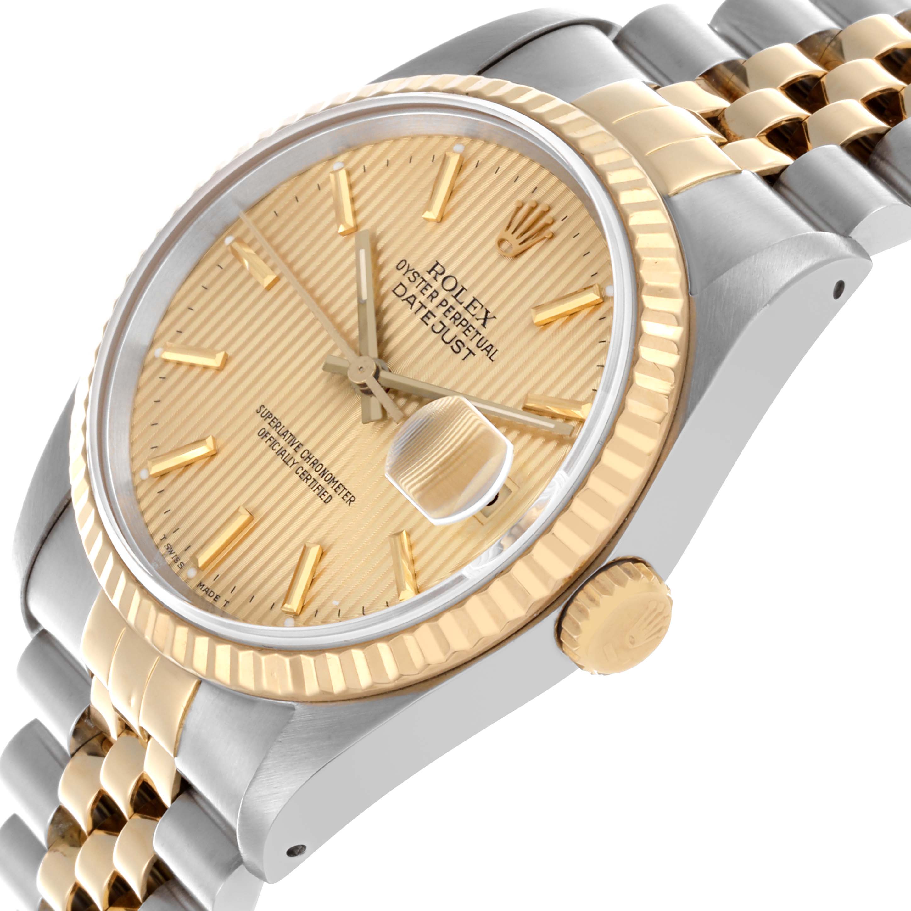 The Rolex Datejust 16233 Men's Steel and Gold (two tone) Champagne Dial 16233 Men's Steel and Gold (two tone) Champagne Dial watch is shown at a slight side angle, displaying the dial, bezel, crown, and bracelet.