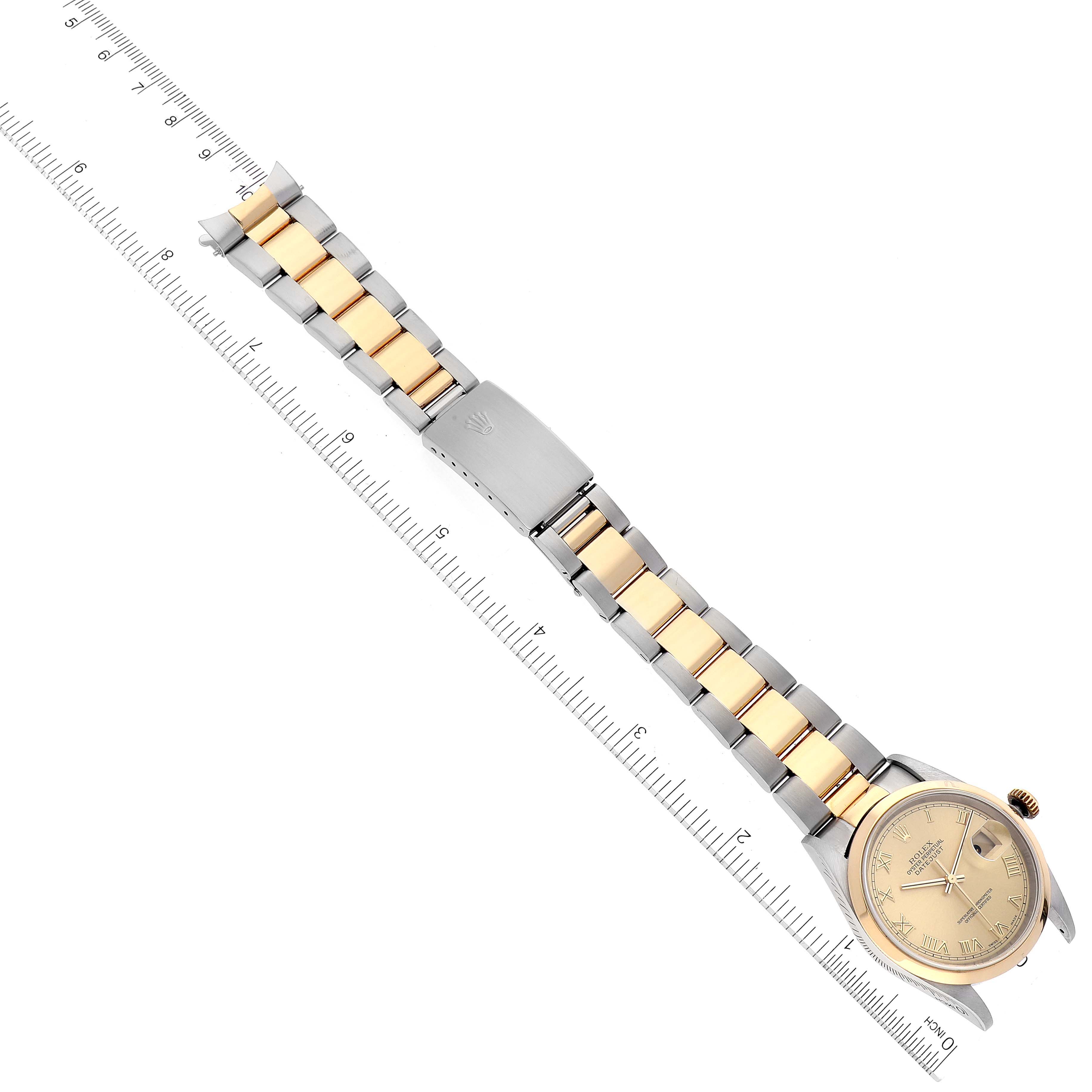 The image shows a top-down view of a Rolex Datejust 16203 Men's Steel and Gold (two tone) Champagne Dial 16203 Men's Steel and Gold (two tone) Champagne Dial watch, highlighting its dial, bracelet, and clasp.
