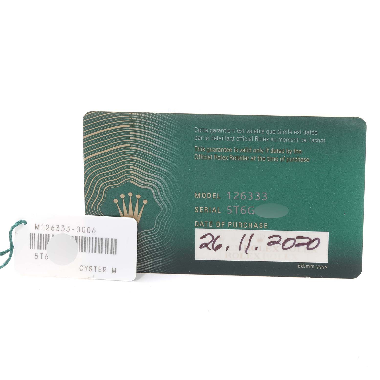 The image shows a warranty card and a tag for a Rolex Datejust 41 126333 Men's Steel and Gold (two tone) Black Dial 126333 Men's Steel and Gold (two tone) Black Dial model, with model and serial numbers visible.