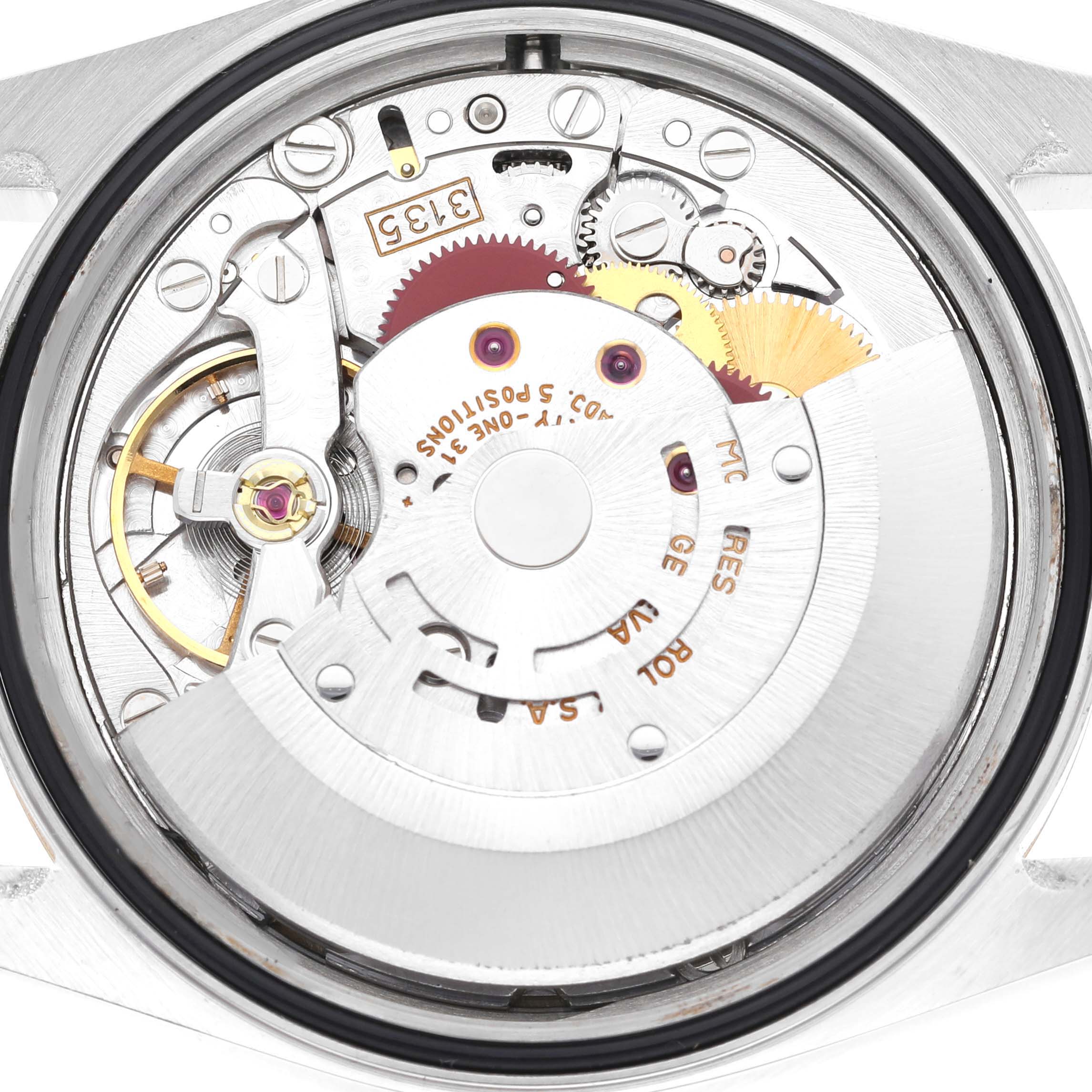 This image shows the internal mechanism of a Rolex Datejust 16233 Men's Steel and Gold (two tone) Champagne Dial 16233 Men's Steel and Gold (two tone) Champagne Dial watch, focusing on its movement components.