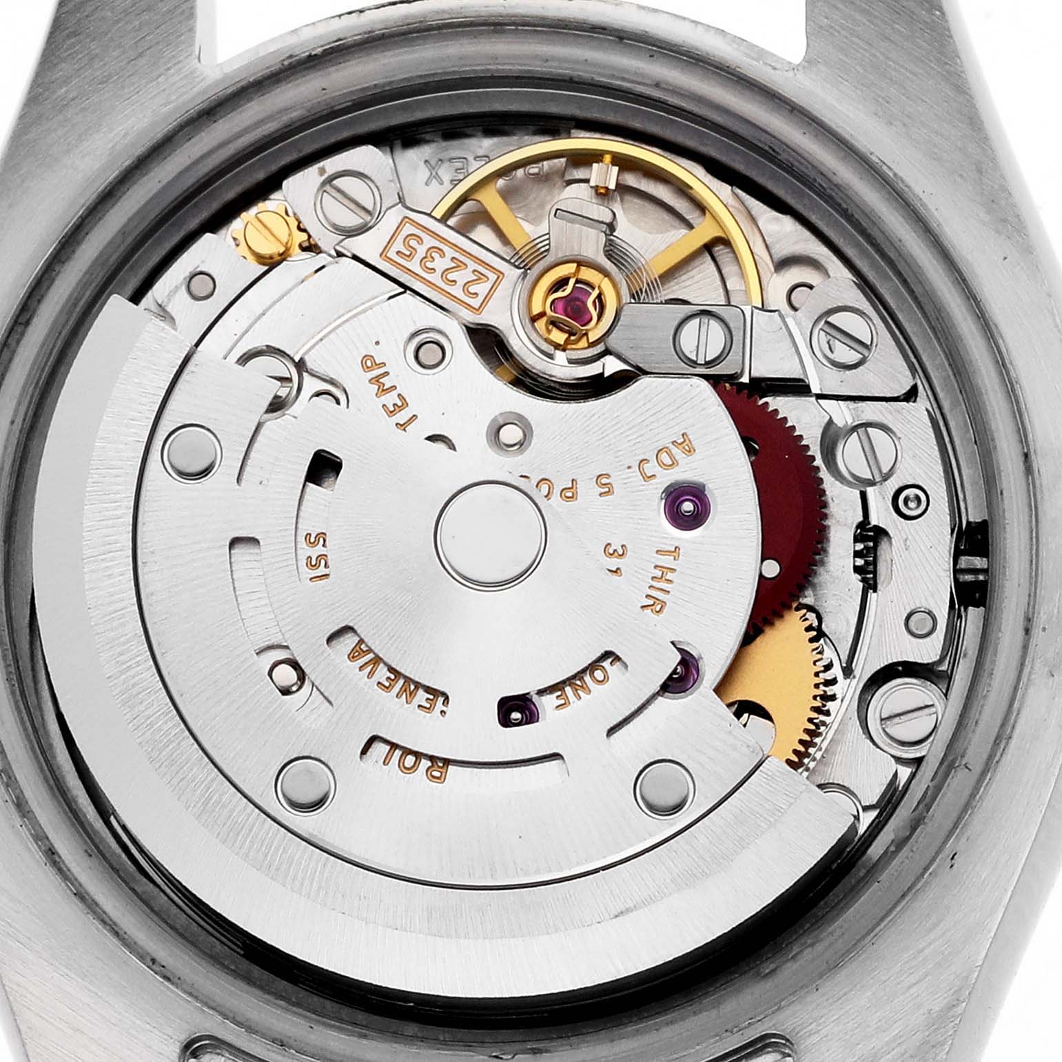 The image shows the inner mechanism of a Rolex Datejust 179171NR Women's Steel and Gold (two tone) Mother of Pearl Dial 179171NR Women's Steel and Gold (two tone) Mother of Pearl Dial watch from a back view, revealing gears and components.