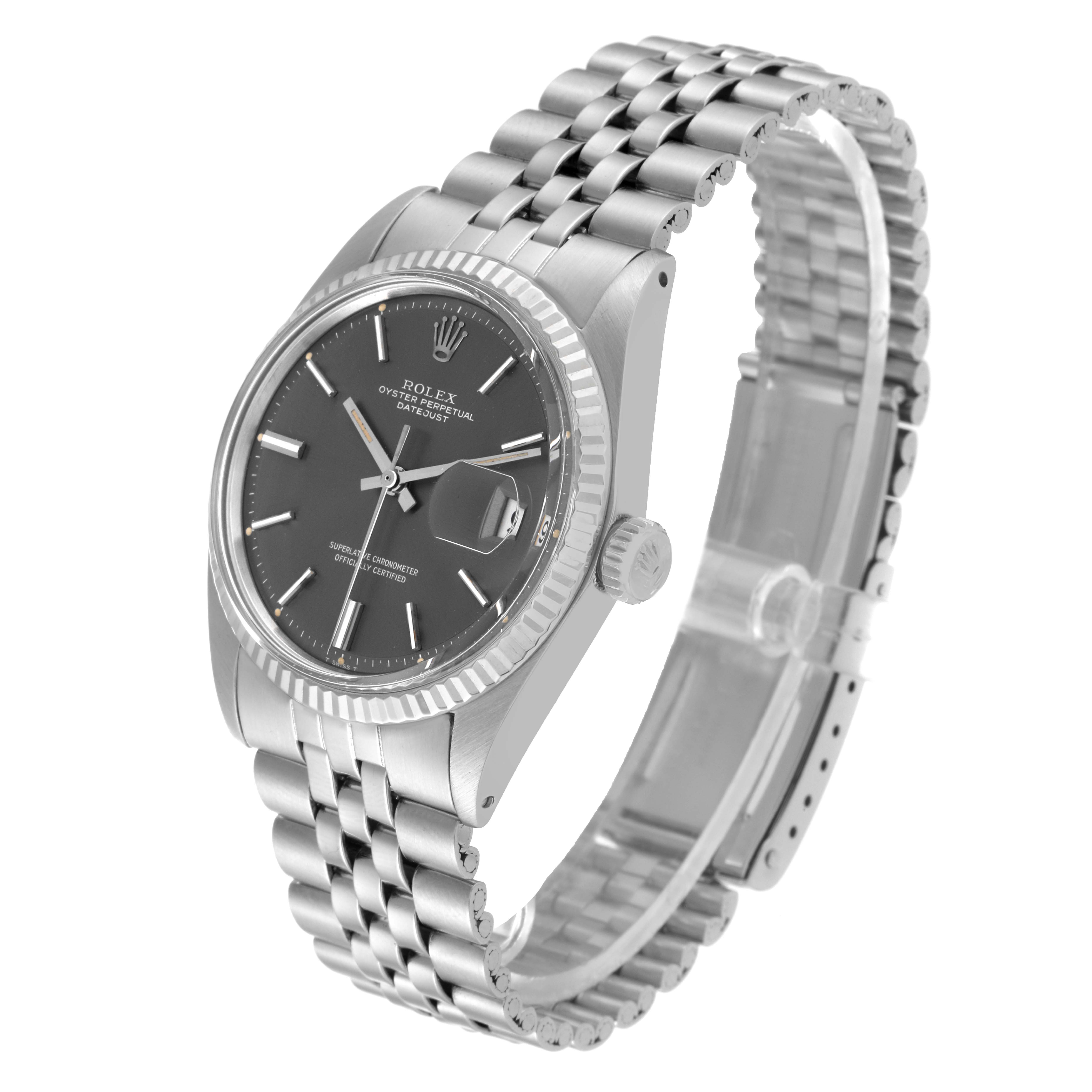 The Vintage Collection Rolex watch is shown at a right-side angle, highlighting the face, crown, and stainless steel bracelet.