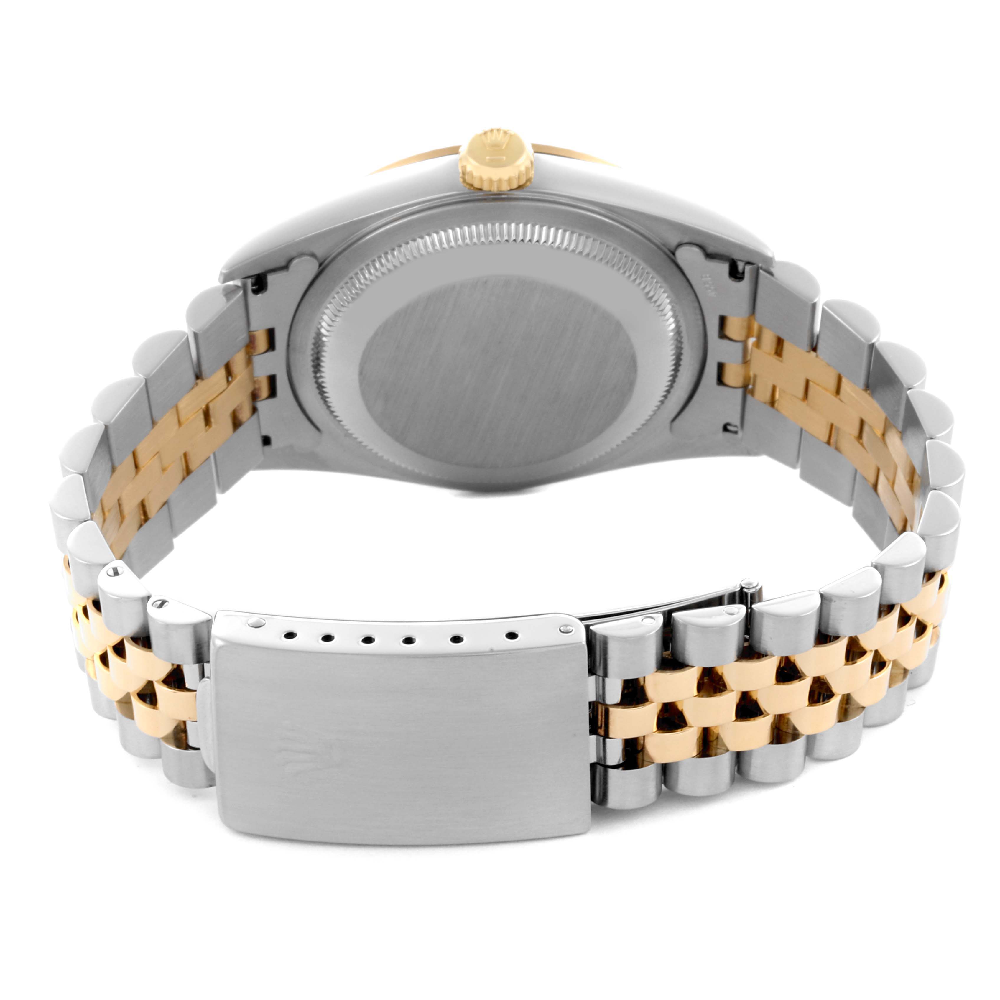 The image shows the back of a Rolex Datejust 16233 Men's Steel and Gold (two tone) Champagne Dial 16233 Men's Steel and Gold (two tone) Champagne Dial watch, highlighting the case back and jubilee bracelet.