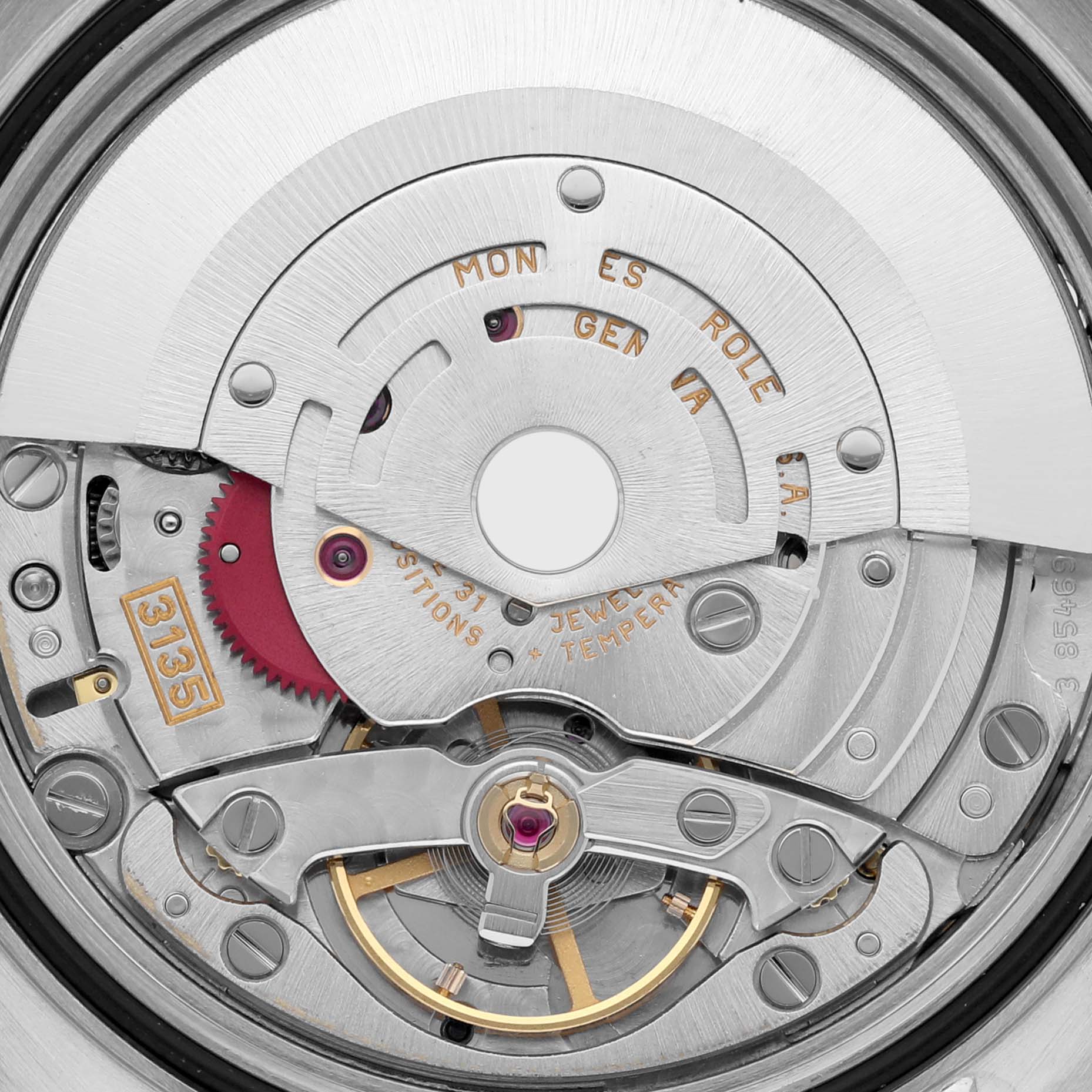 The image shows a close-up of the Rolex Datejust 16233 Men's Steel and Gold (two tone) Champagne Dial 16233 Men's Steel and Gold (two tone) Champagne Dial's movement, highlighting its intricate mechanics.