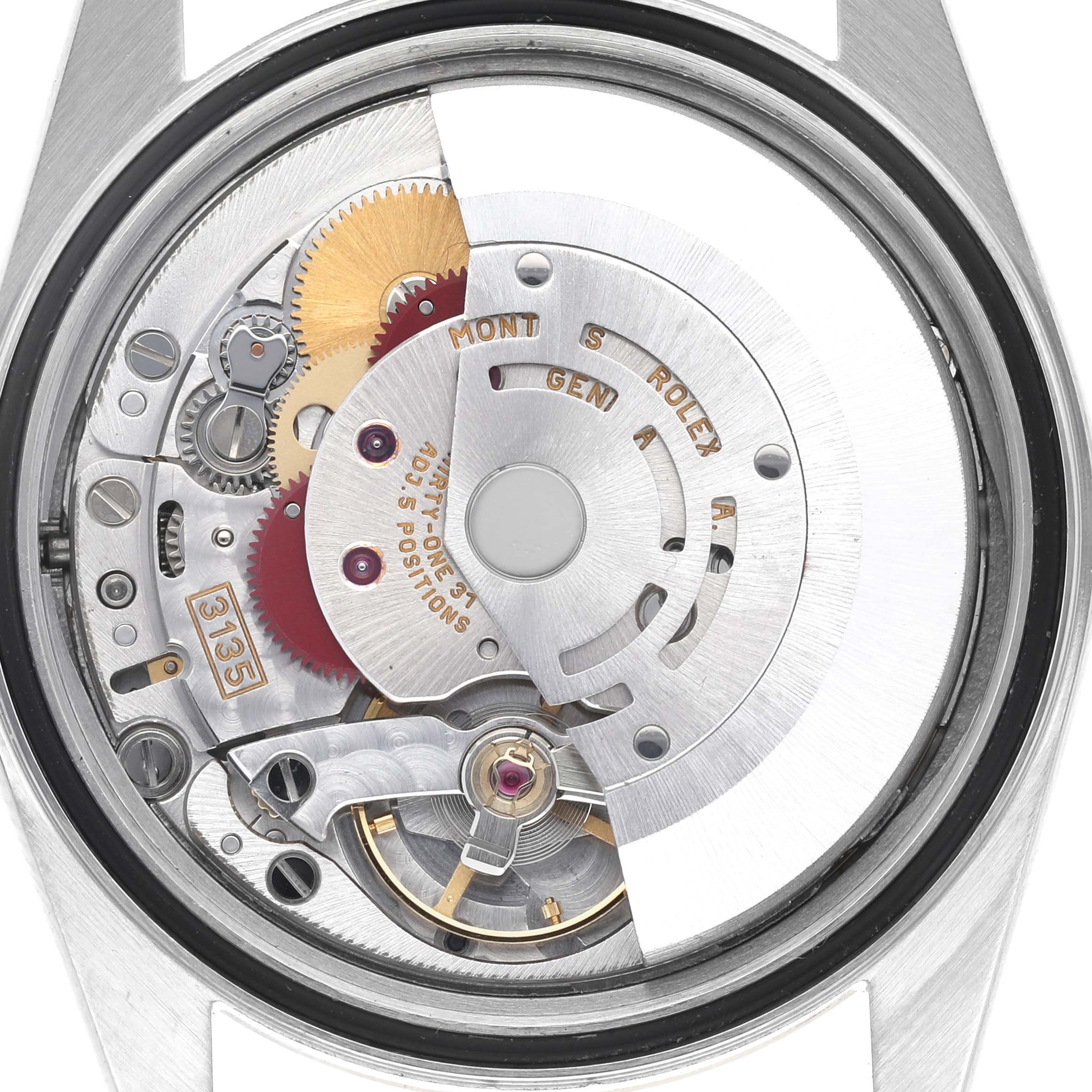 The image shows the back view of the Rolex Datejust 16233 Men's Steel and Gold (two tone) Champagne Dial 16233 Men's Steel and Gold (two tone) Champagne Dial, highlighting its intricate internal movement components.