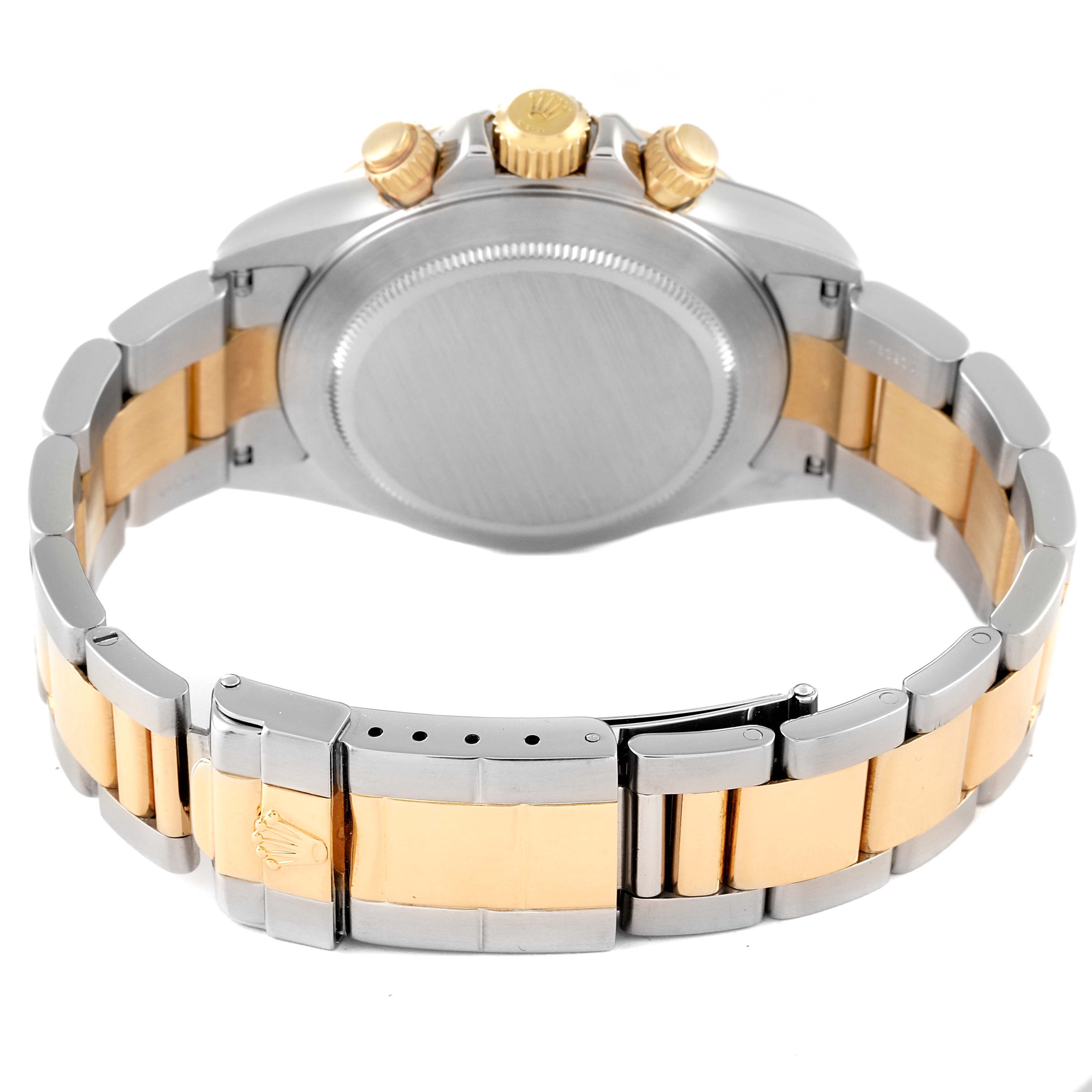 This image shows the back case and bracelet of a Rolex Daytona 16523 Men's Steel and Gold (two tone) White Dial 16523 Men's Steel and Gold (two tone) White Dial watch in a two-tone metal finish.