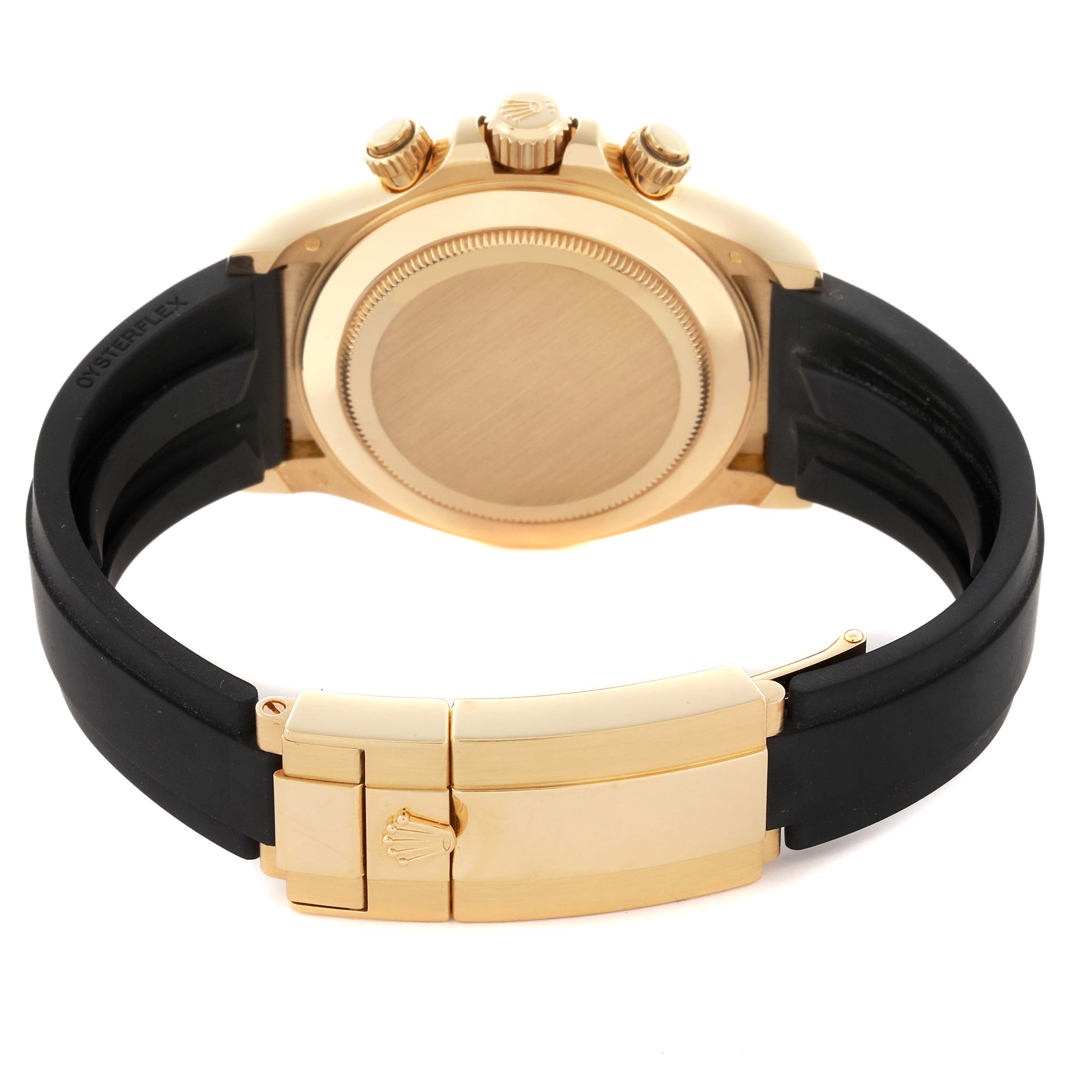 The image shows the back view of a Rolex Daytona 116518LNG Men's Yellow Gold Black Dial 116518LNG Men's Yellow Gold Black Dial watch, featuring its gold case and black Oysterflex strap.