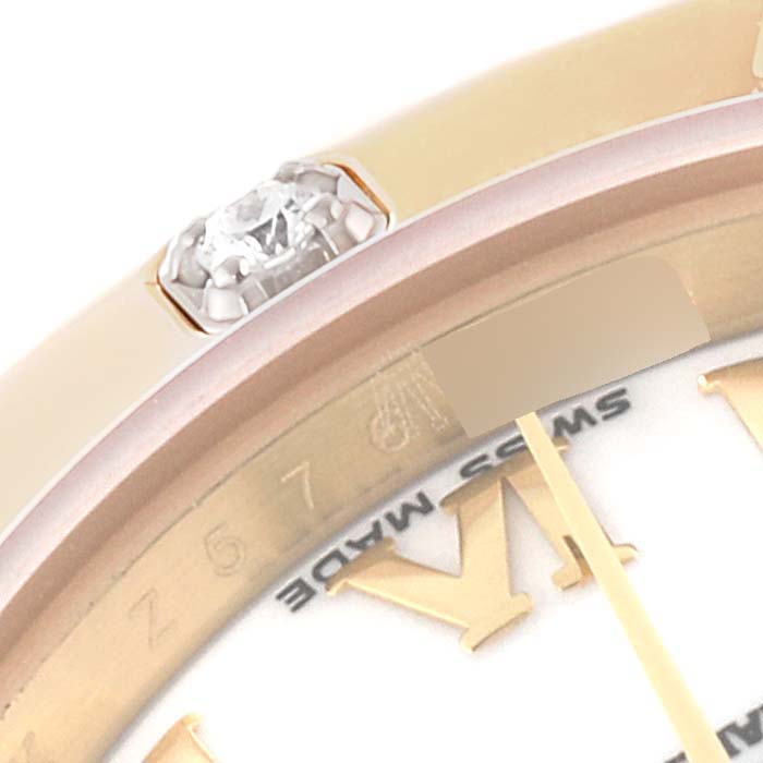 This image shows a close-up of the bezel, dial, and diamond detailing of the Rolex Pearlmaster 80318 Women
s Yellow Gold White Dial 80318 Women
s Yellow Gold White Dial watch.