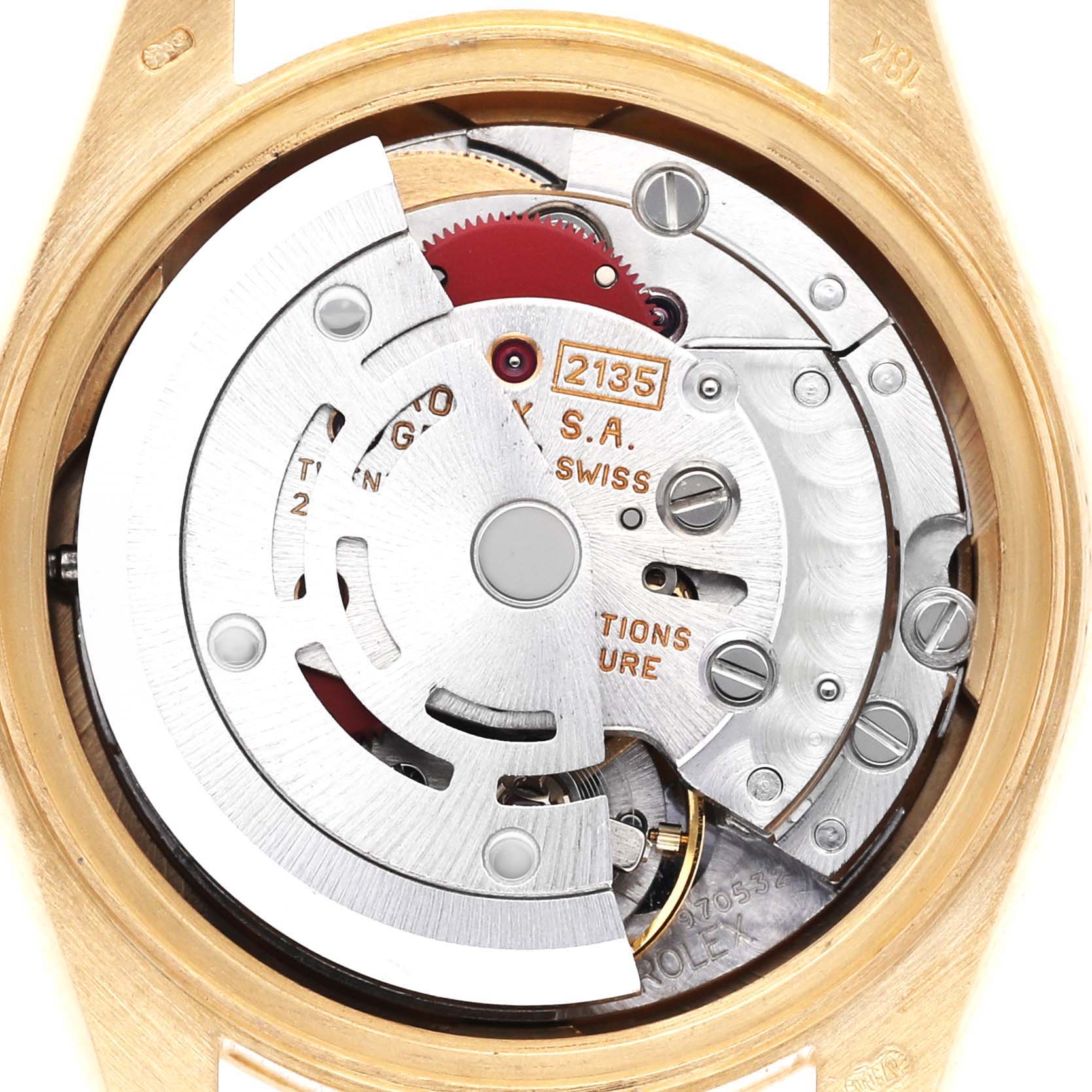 The image shows a close-up of the Rolex President 69178 Women's Yellow Gold Champagne Dial 69178 Women's Yellow Gold Champagne Dial model's movement from the back, focusing on its internal mechanism.