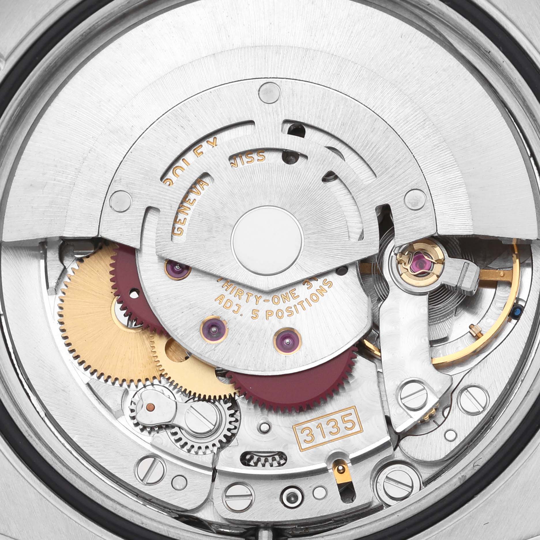 The image shows the intricate internal movement of the Rolex Turn-o-Graph 116263 Men's Steel and Gold (two tone) Grey Dial 116263 Men's Steel and Gold (two tone) Grey Dial watch, highlighting gears and mechanical components.