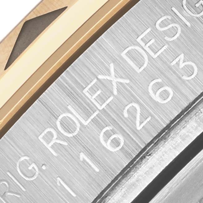 The image shows a close-up of the bezel and engraved design details on the Rolex Turn-o-Graph 116263 Men's Steel and Gold (two tone) Grey Dial 116263 Men's Steel and Gold (two tone) Grey Dial watch.